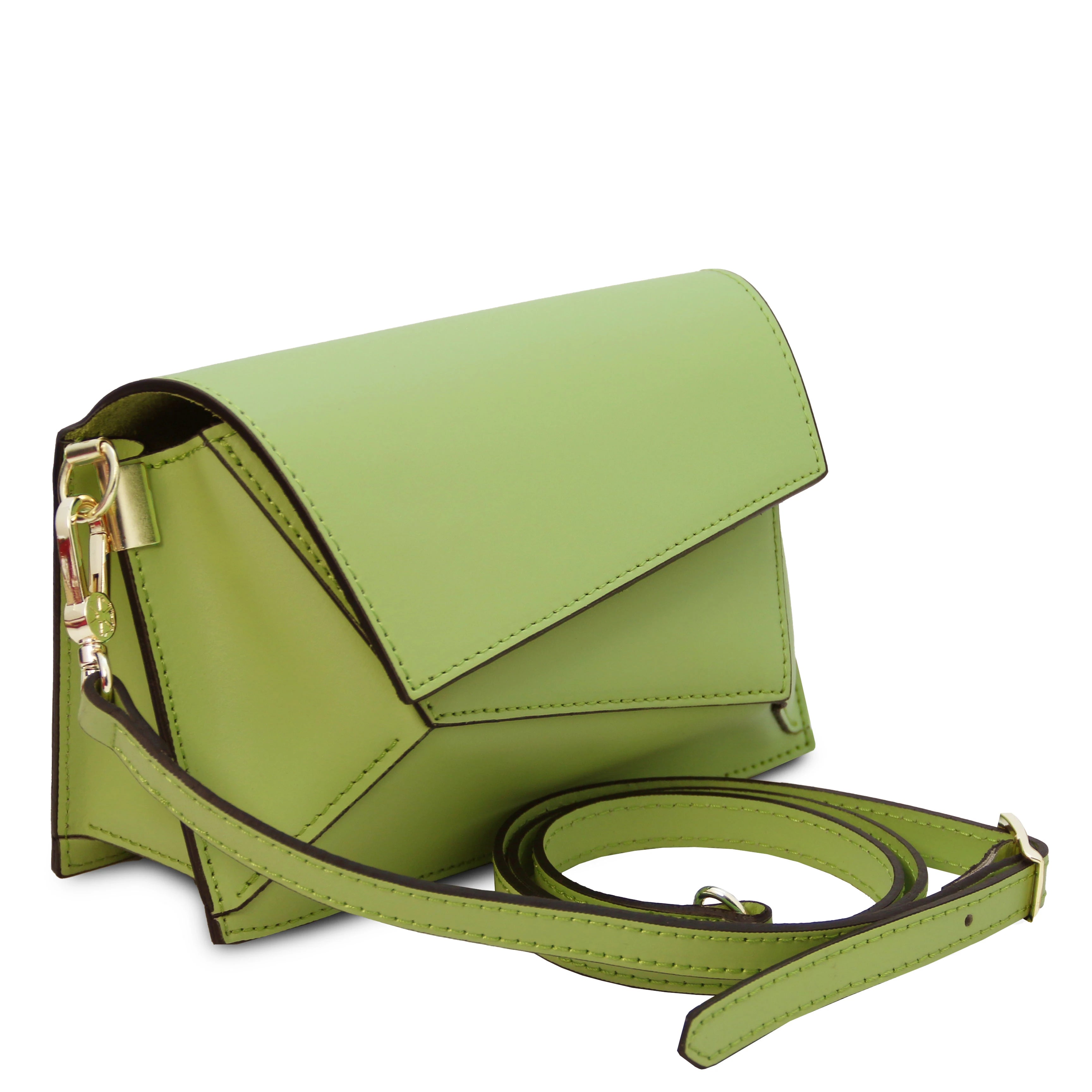 Front angled view TL Leather Assymetrical Shoulder Bag in Green showing bag sa a clutch sitting near its deatchable shoulder strap - L'Atelier Global