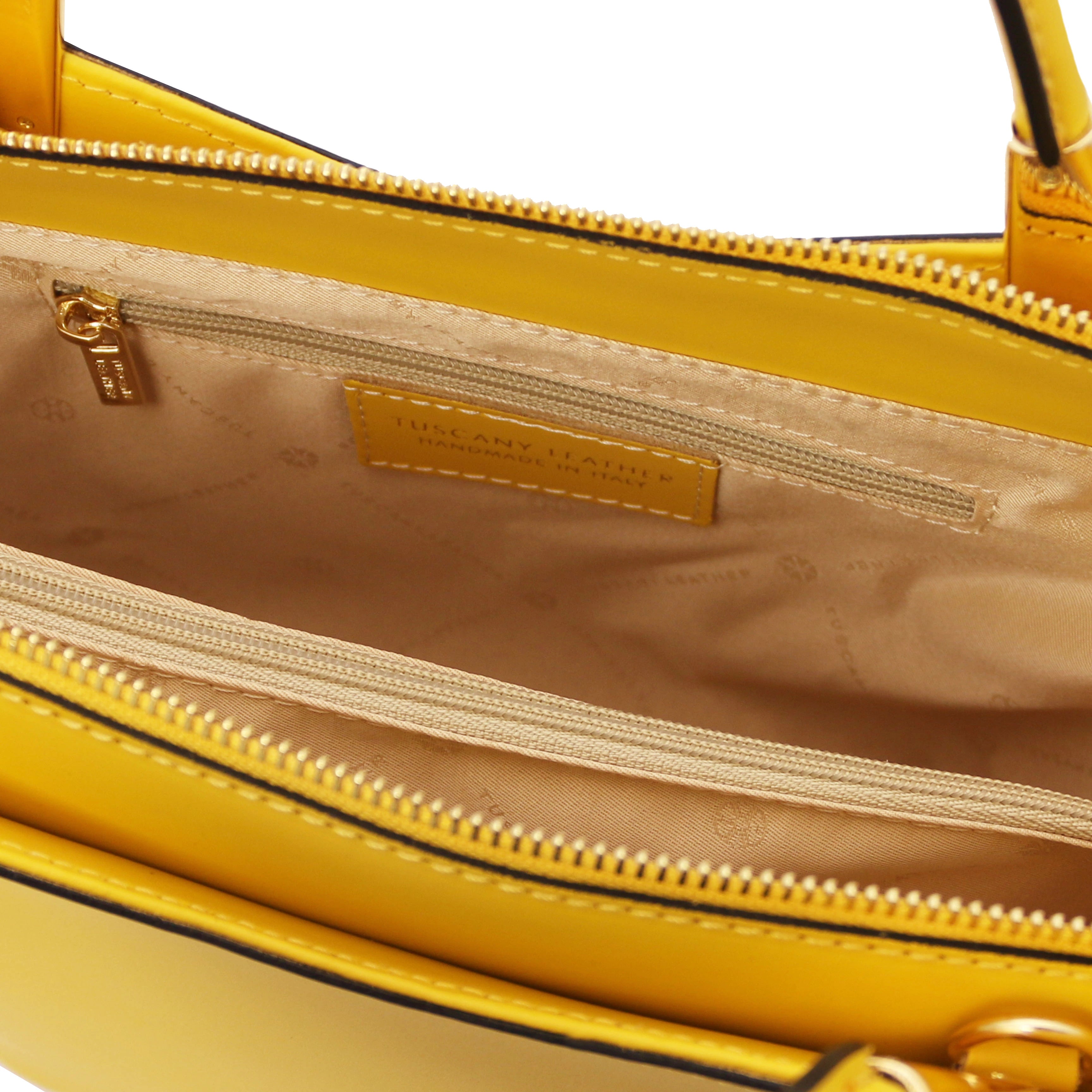 TL Bag Italian Leather Handbag Yellow interior view showing centered zippered compartment, beige lining, zippered pocket