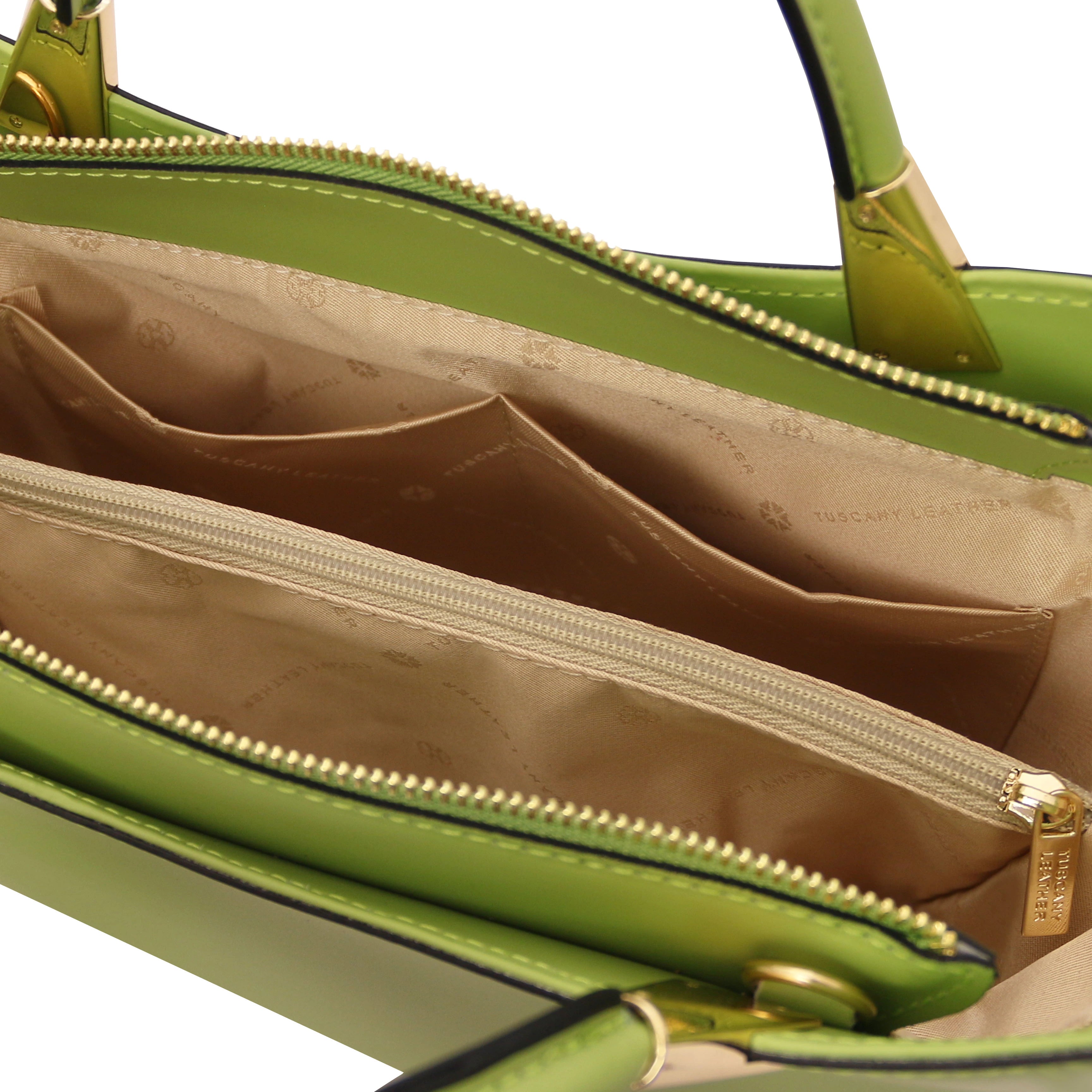 TL Bag Italian Leather Handbag in Green interior view showing centered zippered, beige lining, compartment and open pockets