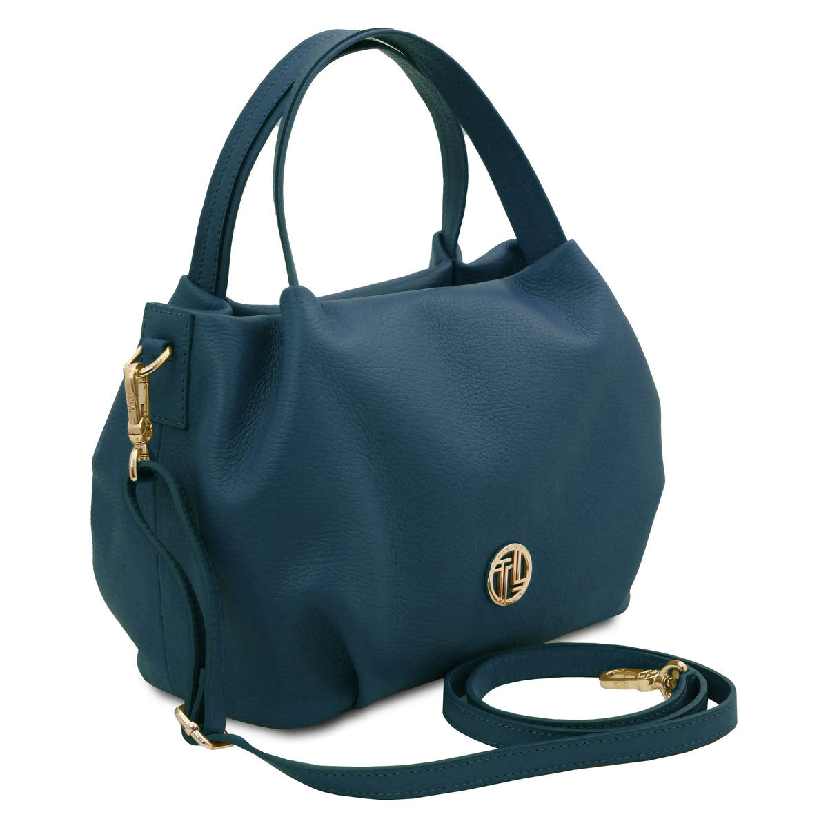 A dark teal pebbled leather handbag with gold-tone hardware, featuring dual top handles, a zippered main compartment, and a detachable shoulder strap, shown on a plain white background.