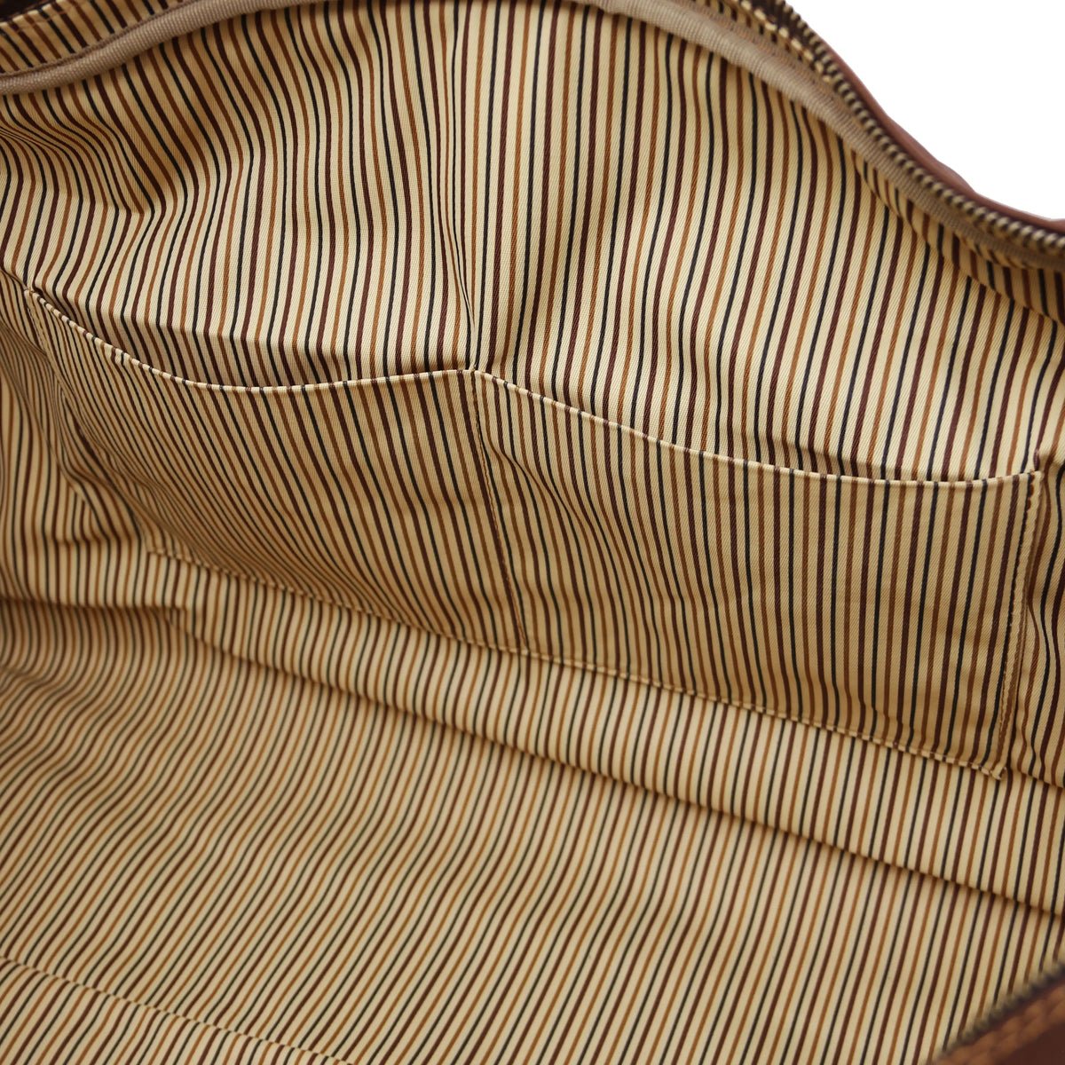 Close-up of a dark brown bag with beige striped fabric with two opened pockets
