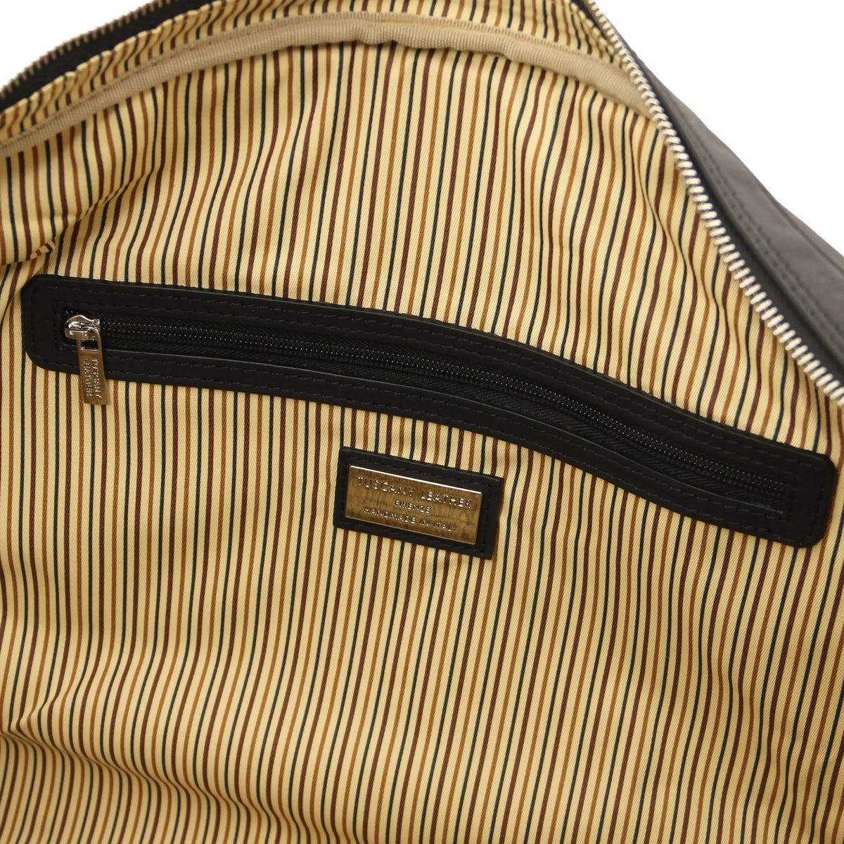 Black leather duffel bag with a brown striped cotton lining interior.