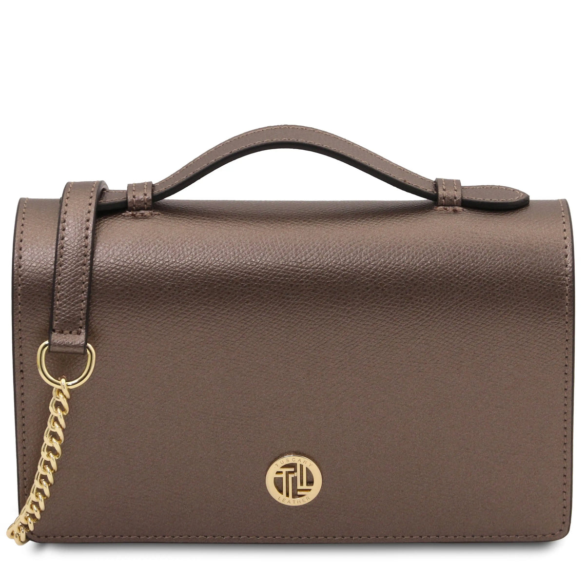 A bronze leather handbag with a top handle, a gold-tone chain detail, and a circular gold-tone logo on the front, set against a plain white background.