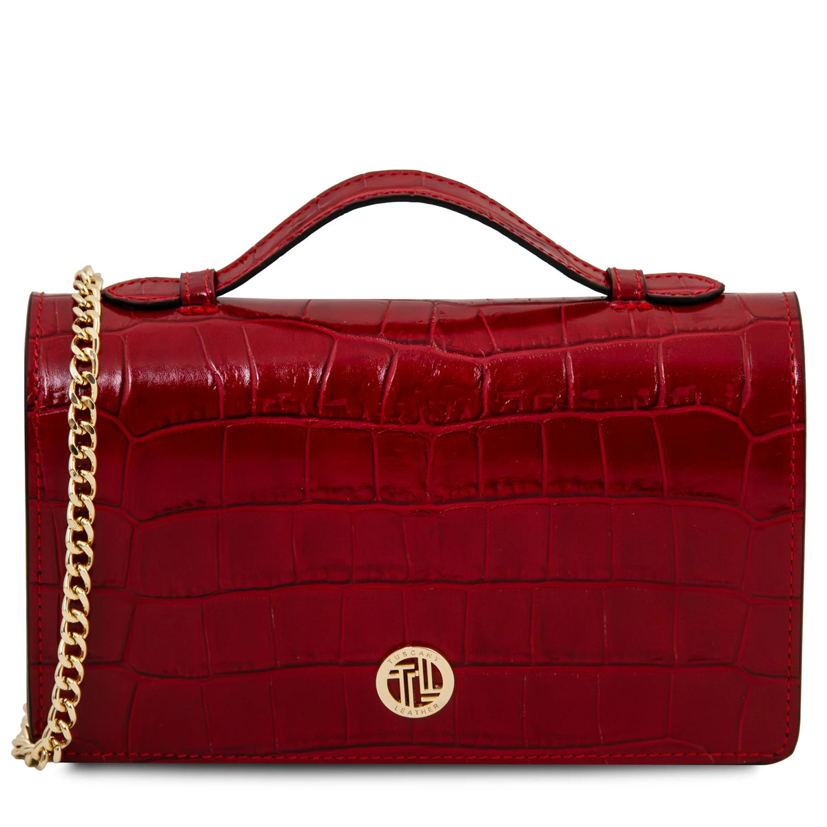 A red crocodile-embossed leather handbag with a top handle, a gold chain strap, and a gold circular logo clasp on a white background.