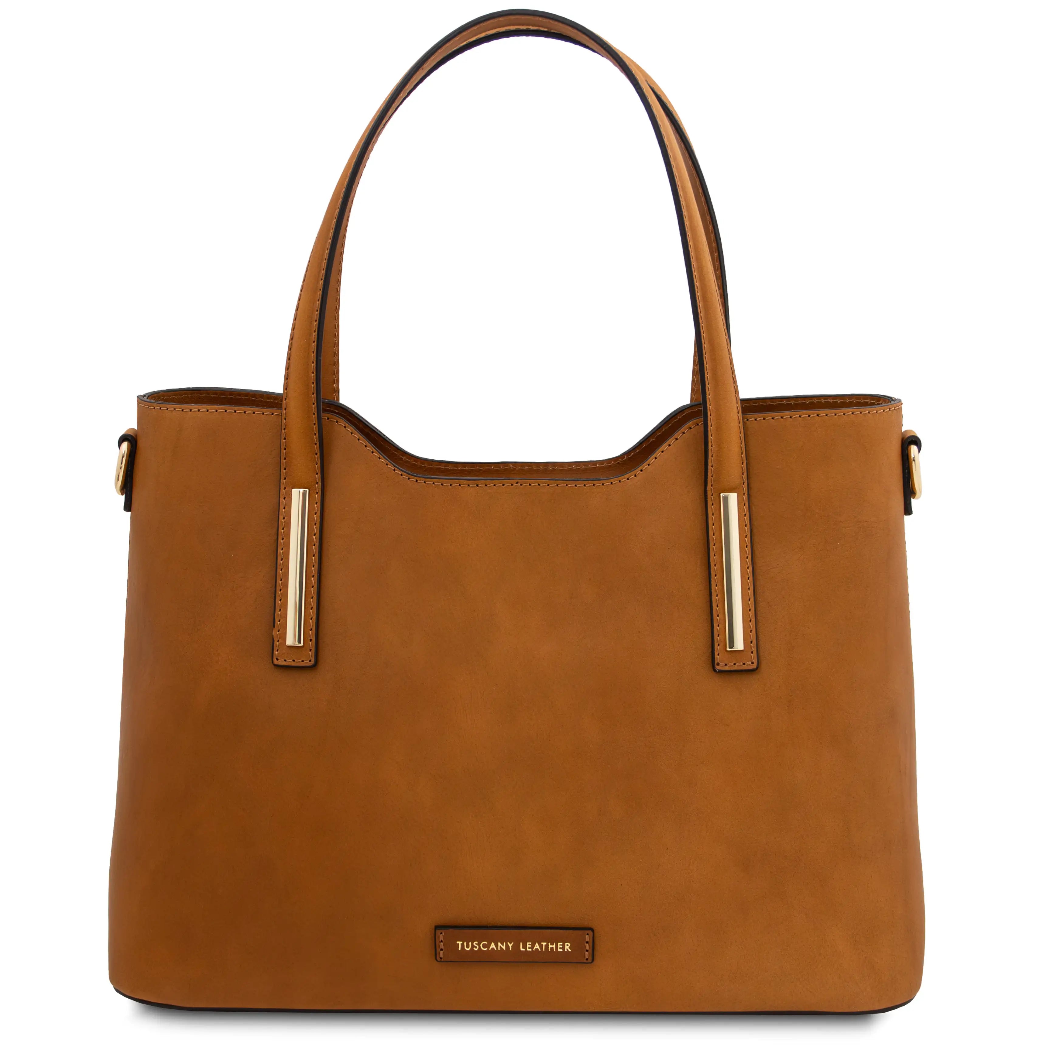 Front view Olimpia Leather Tote Bag in Natural with gold accents on handles on white background