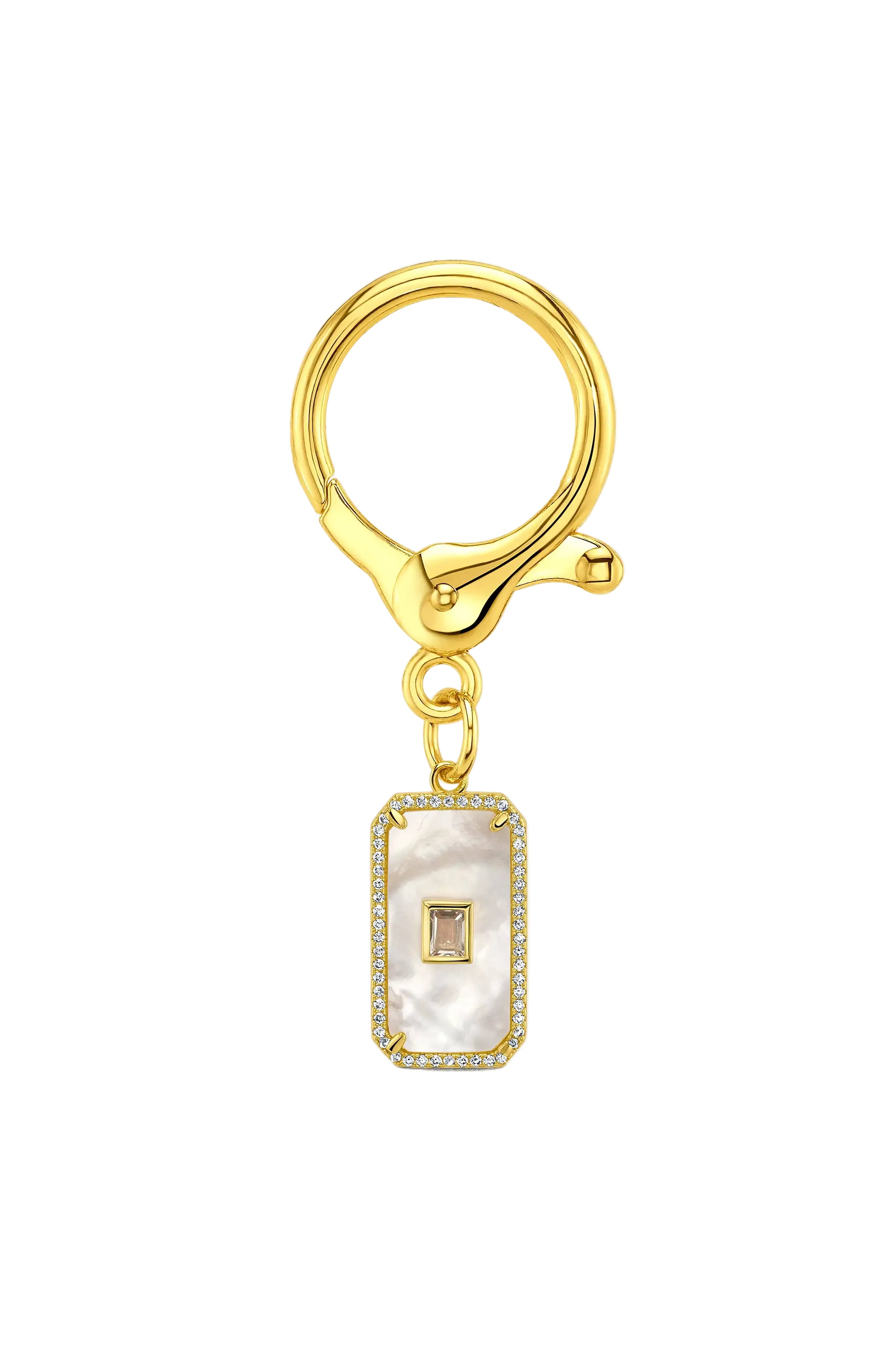 A gold-toned rectangular keychain or bag charm featuring a white mother-of-pearl inlay with a small central gold square, surrounded by a border of tiny clear CZ's, shown on a plain white background.