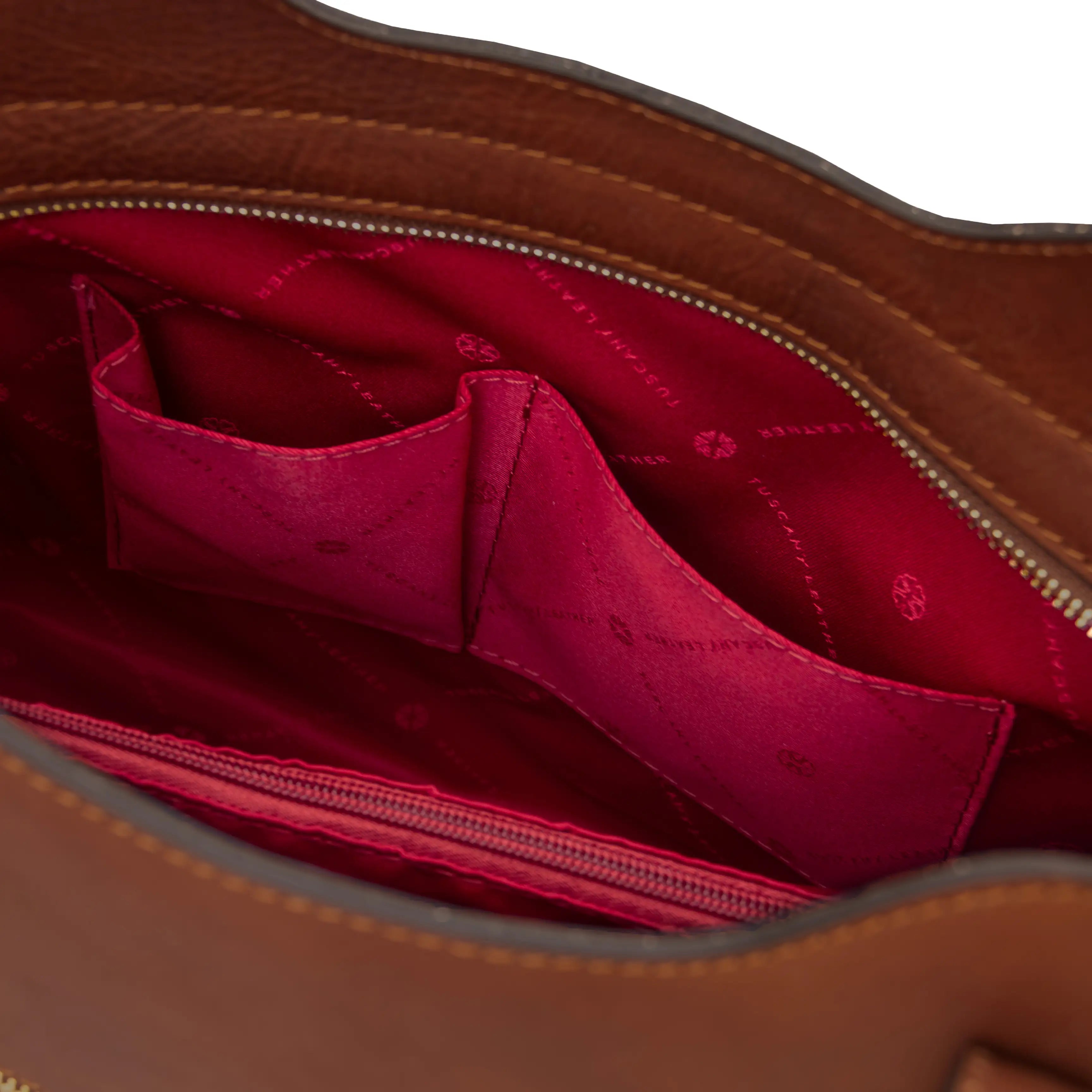 Interior opened pocket red lining view Olimpia Leather Tote Bag in Brown