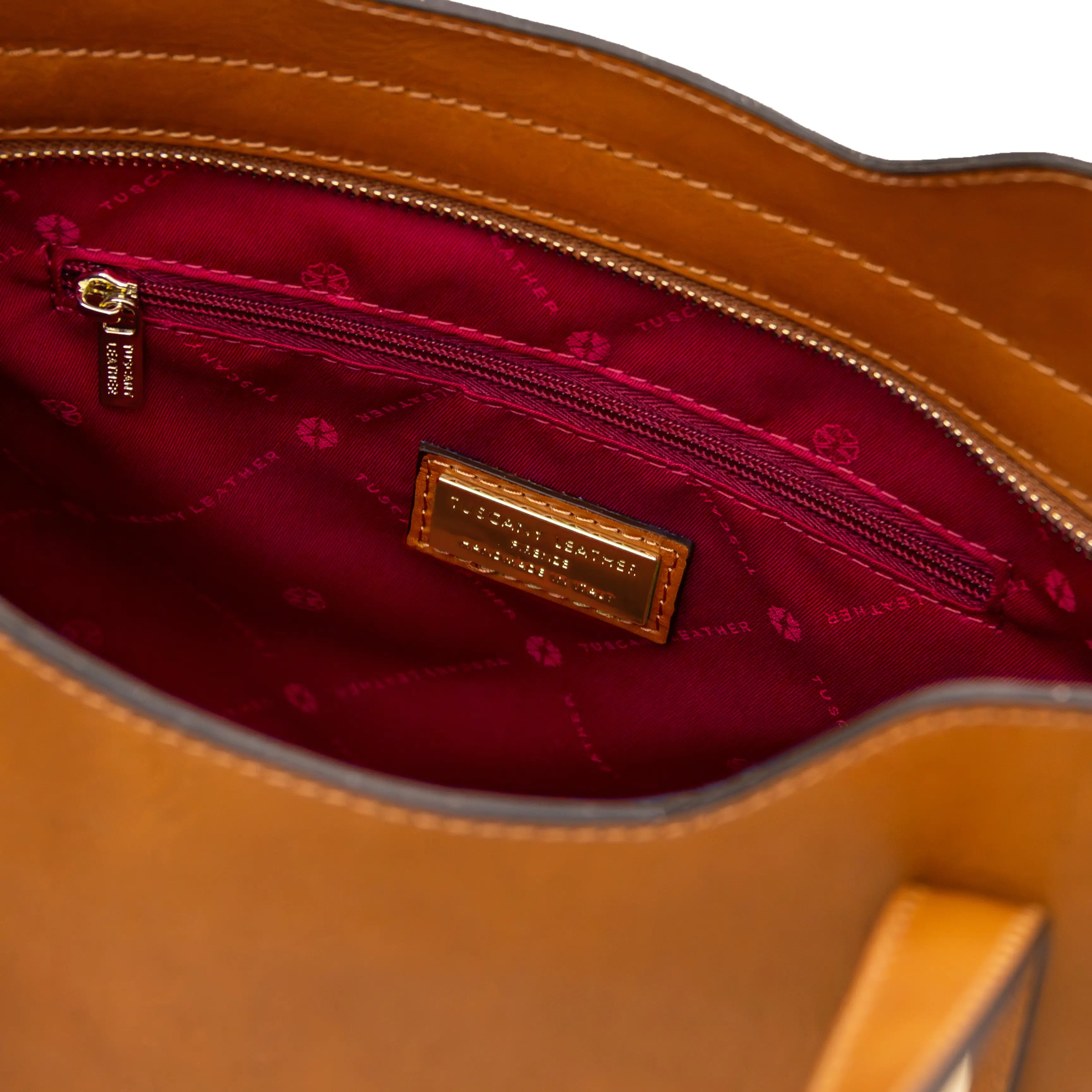 Interior zip pocket red lining view Olimpia Leather Tote Bag in Natural