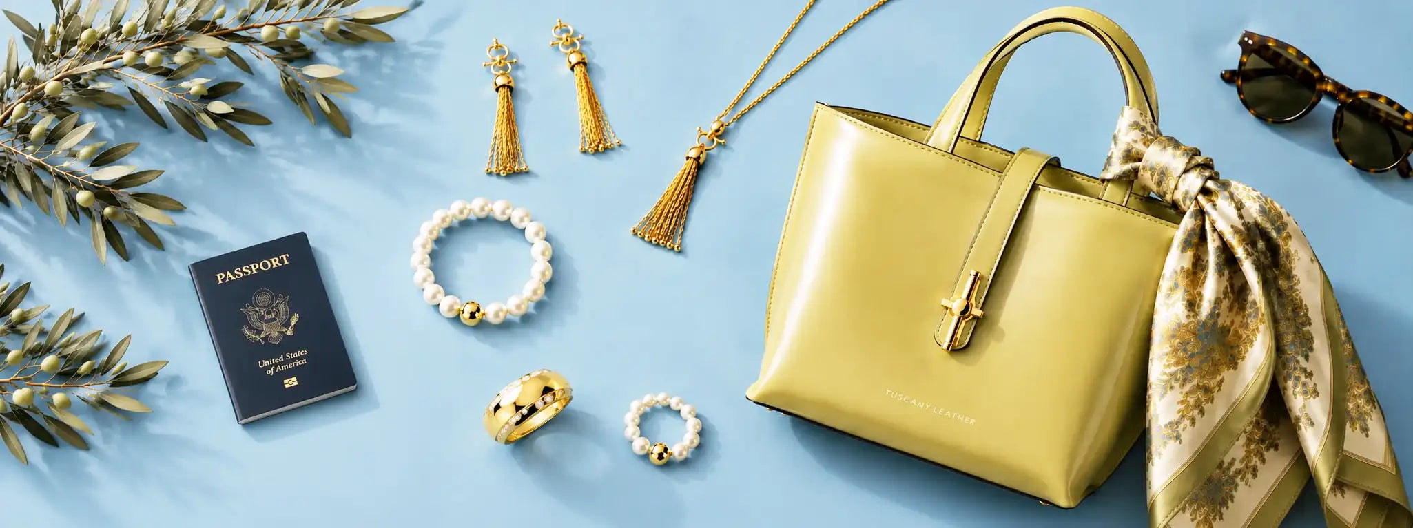 Green Yellow handbag with accessories on a blue background