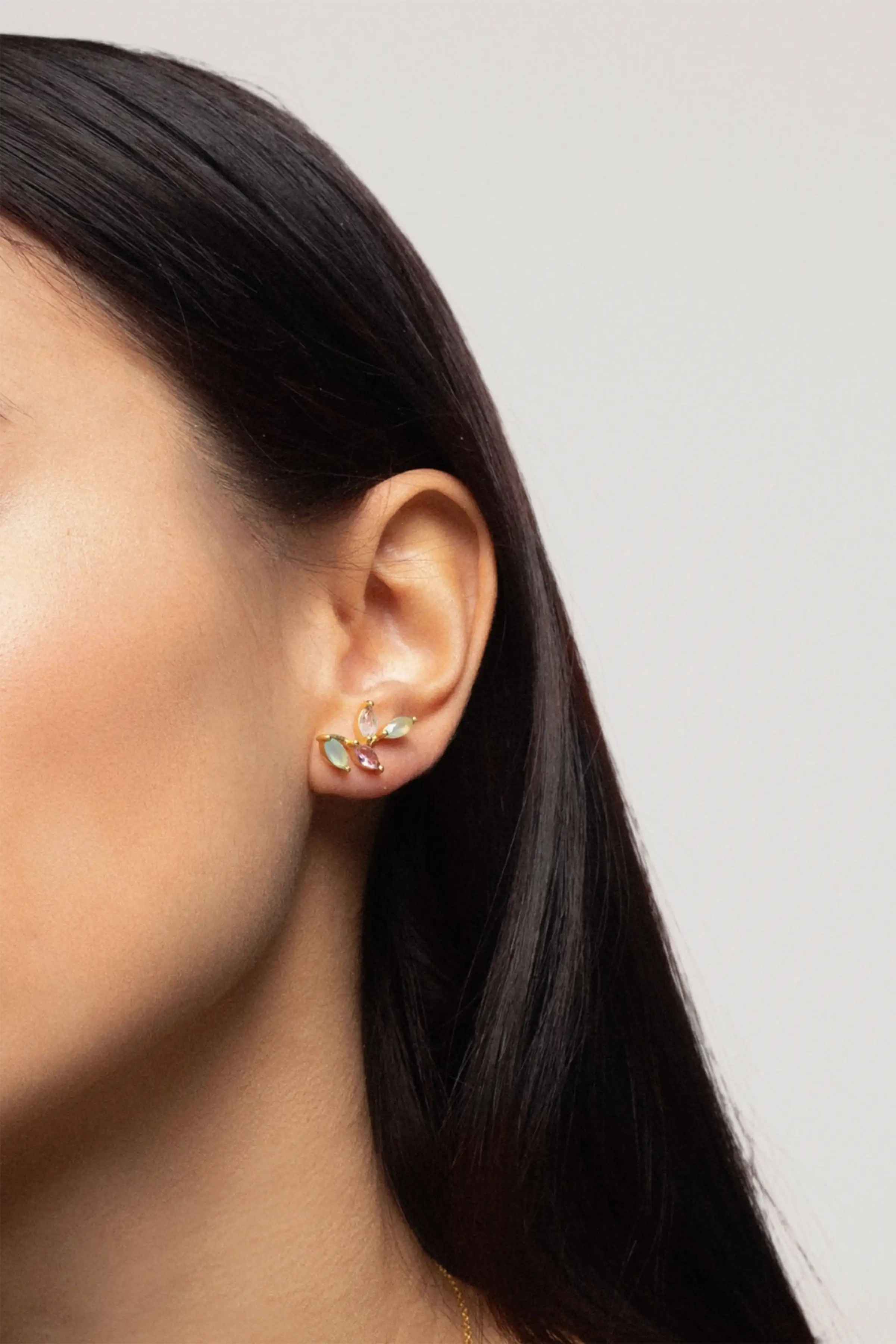 Model wearing Padma Lotus Flower Climber Earrings handcrafted in 22K gold-plated sterling silver