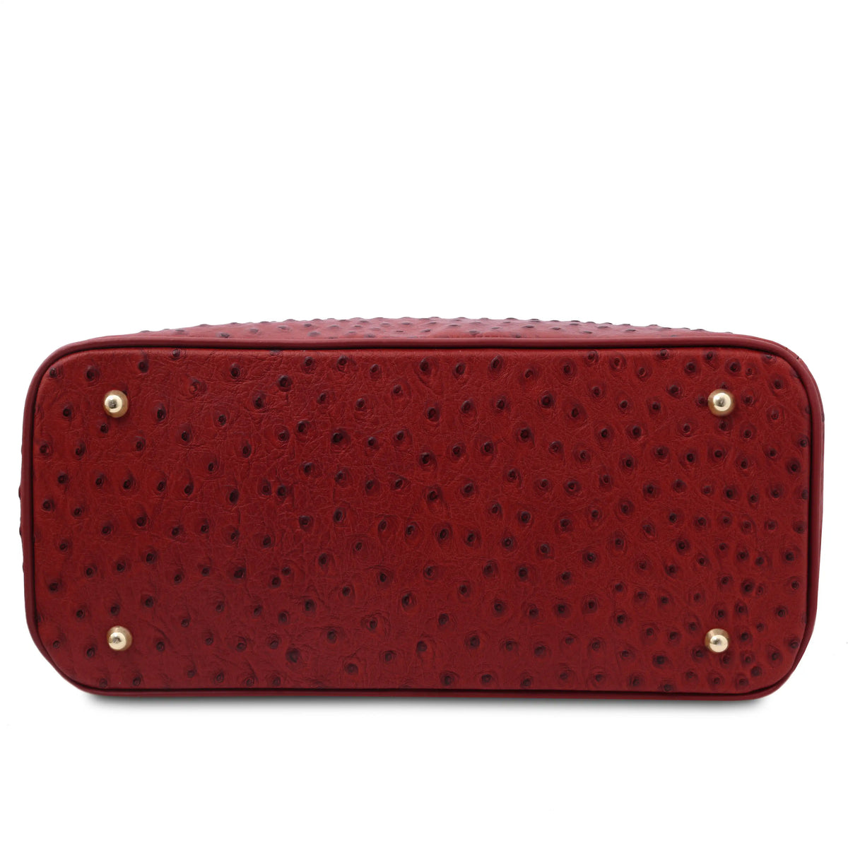 Bottom view Red textured handbag with gold protective feet on a white background