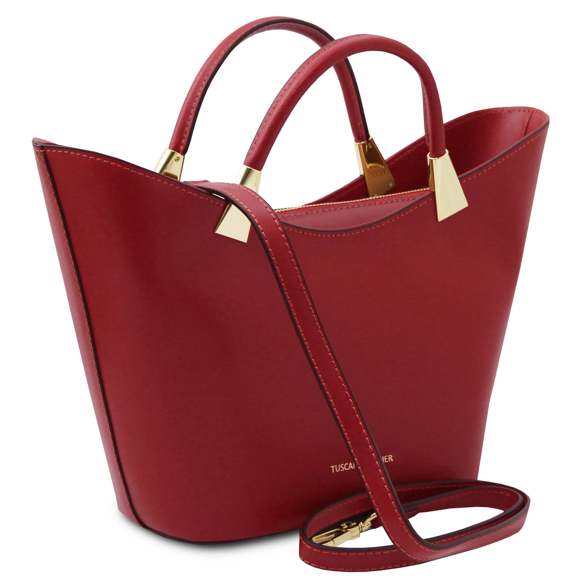 Red handbag with gold accents on a white background with a detachable shoulder strap