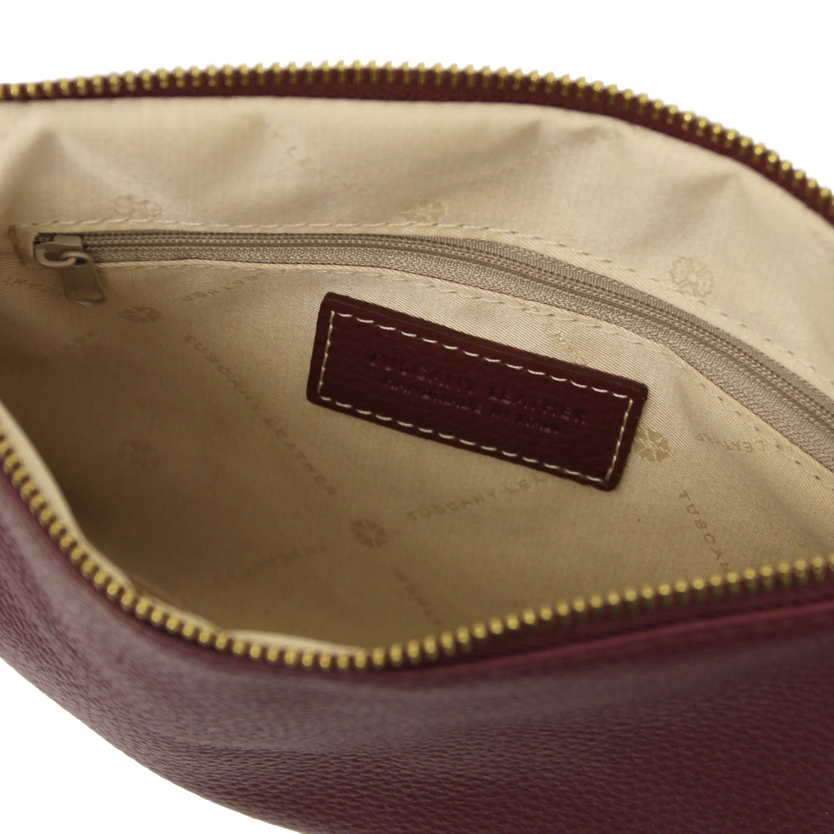 Interior zip pocket view Soft Leather Clutch in Bordeaux with beige lining