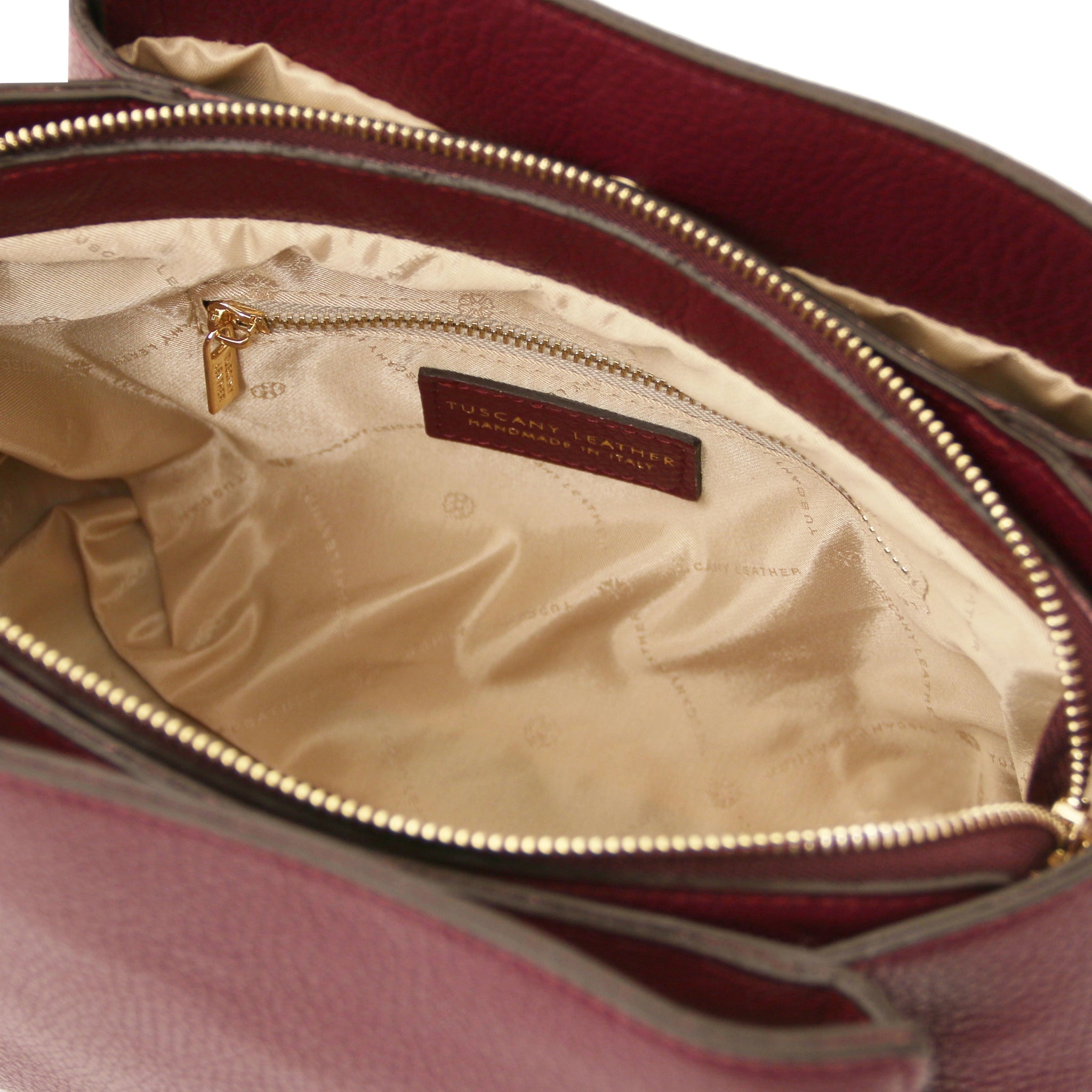 Interior Zip Pocket View Abby Italian Leather Shoulder Bag in Bordeaux with beige interior