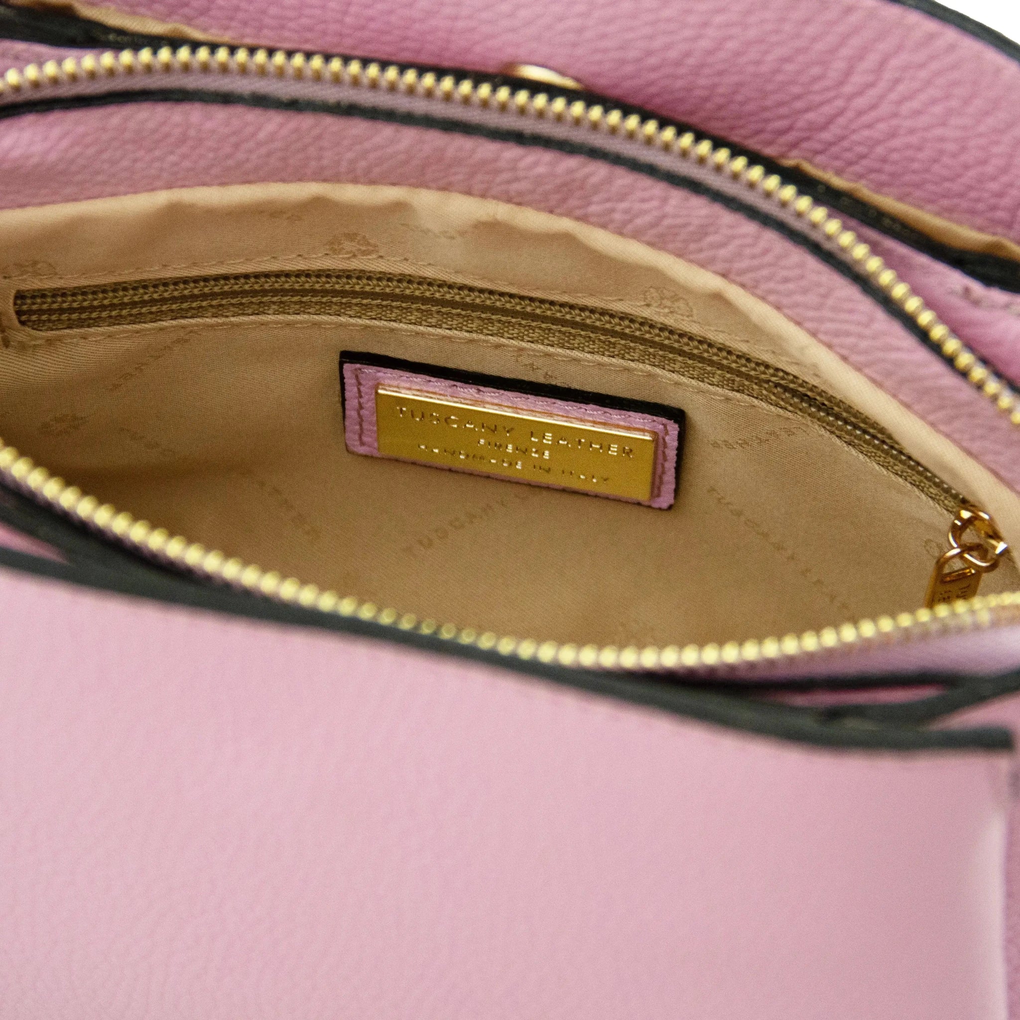 Interior zip pocket view Ballet Pink Abby Leather Bag with beige lining