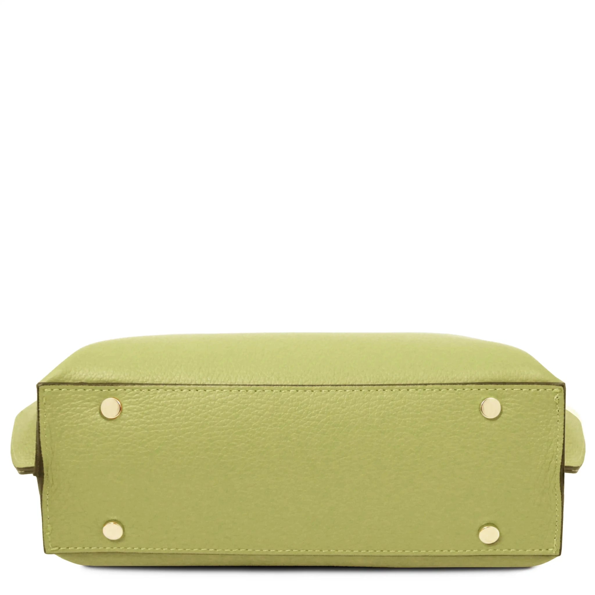 Bottom view of lime green leather bag with gold protective feet on a white background