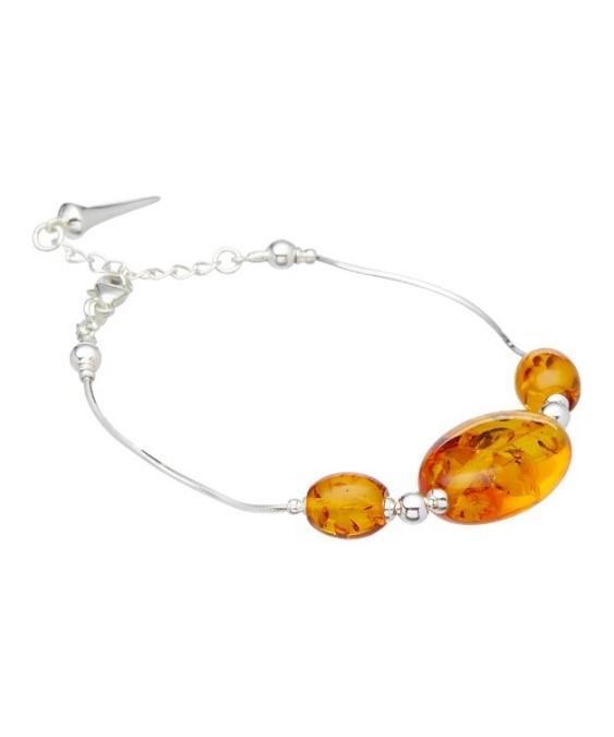 Baltic Honey Amber Stone Bracelet on white showcasing three amber stones, a sterling silver setting and adjustable fit .