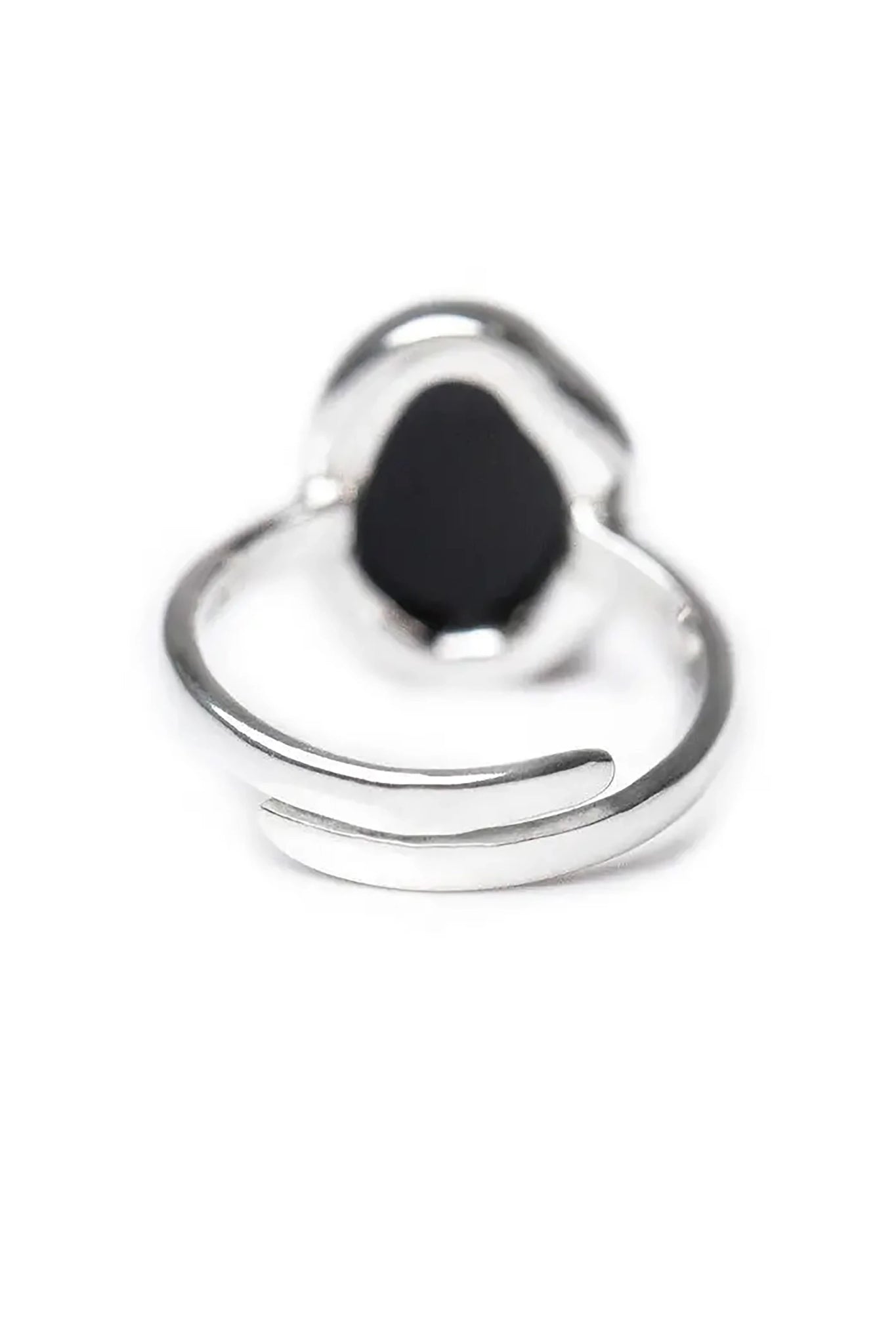 The back of the Baltic Green Amber Element Solitaire Adjustable Ring is in front of a white background