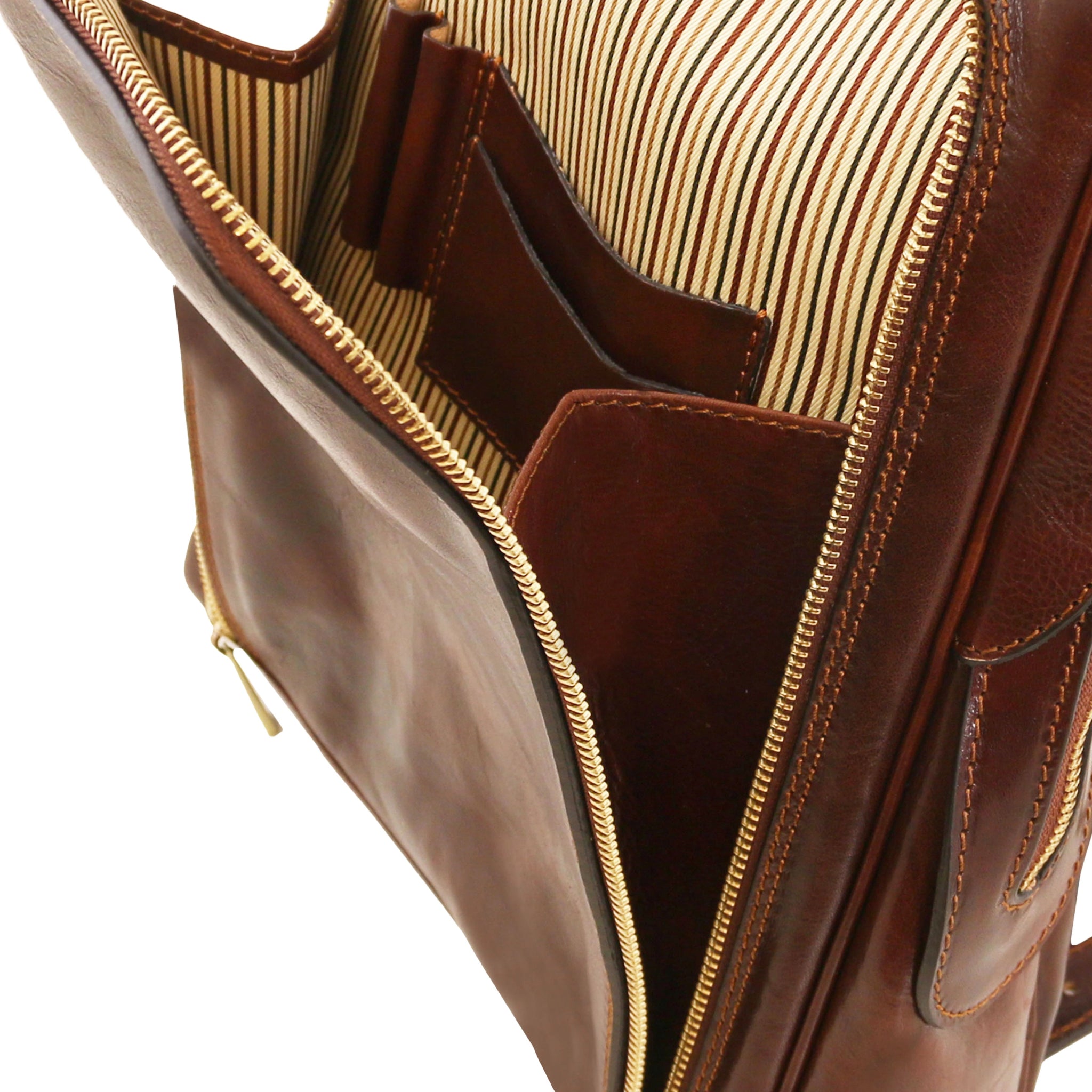 Close-up of a brown leather bag with striped lining and front organizational pocket