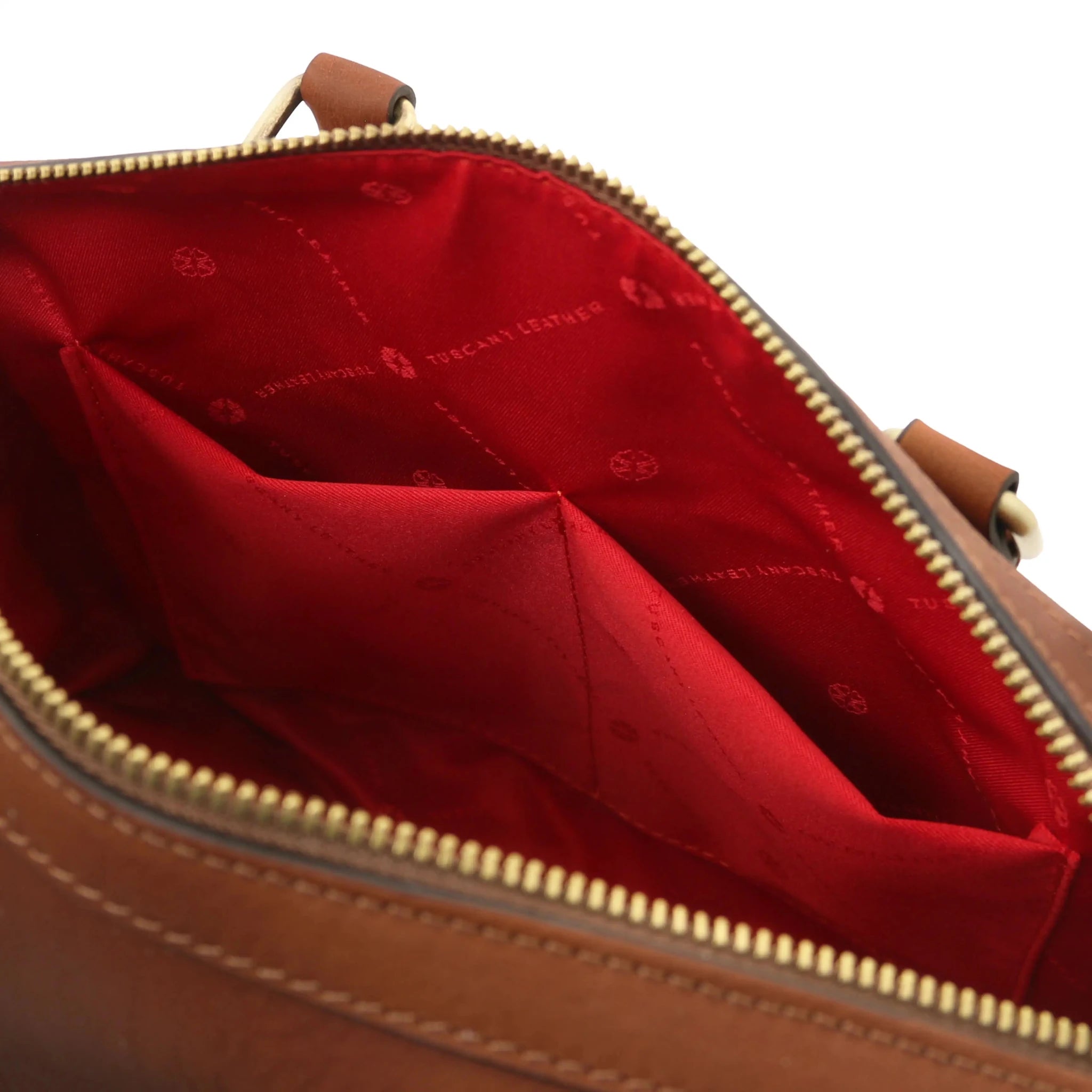 Interior open pockets view Barrique Leather bag in brownwith red lining