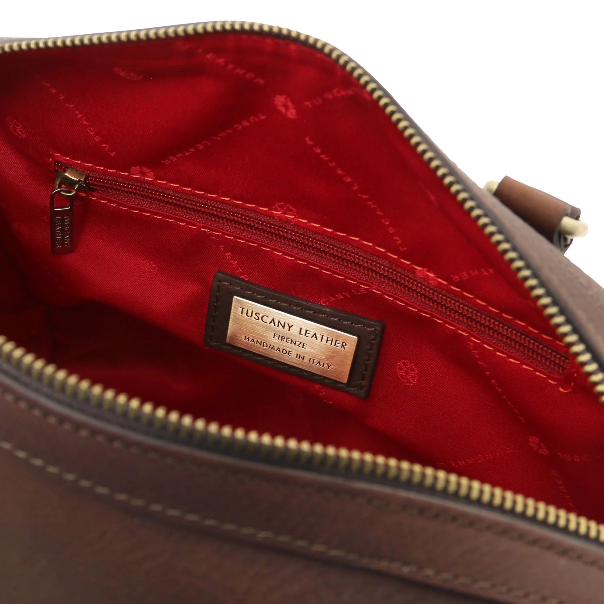 Interior zip pockets view Barrique Leather bag in dark brown with red lining