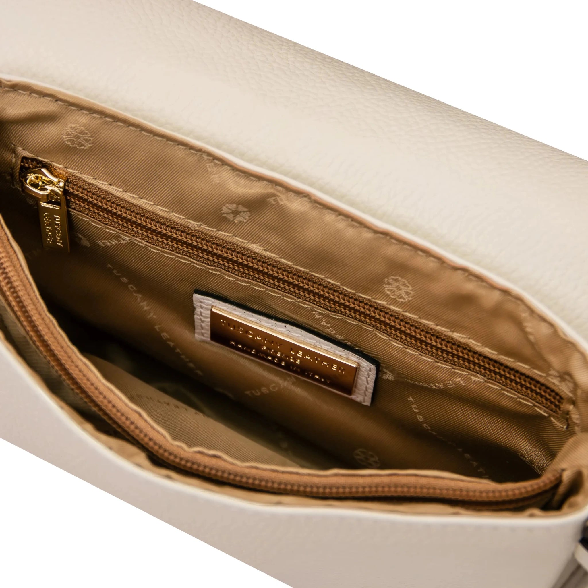 Interior zip and central compartment pockets tan lining view Biscuit Soft Shoulder Bag in Beige