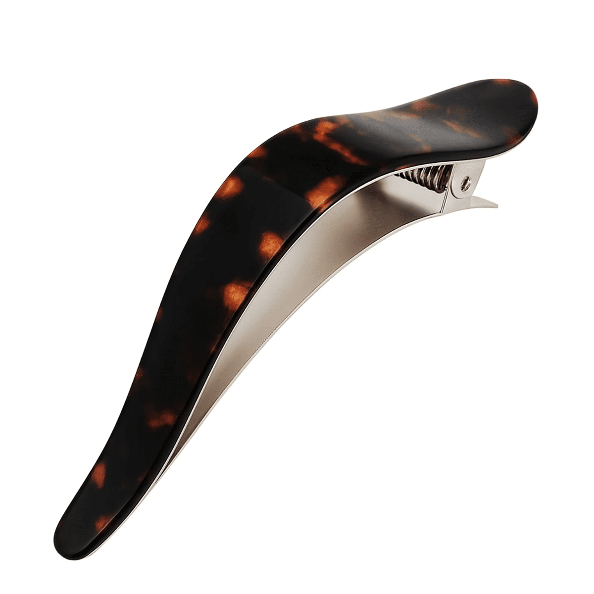Tortoise shell hair clip in silver on a white background
