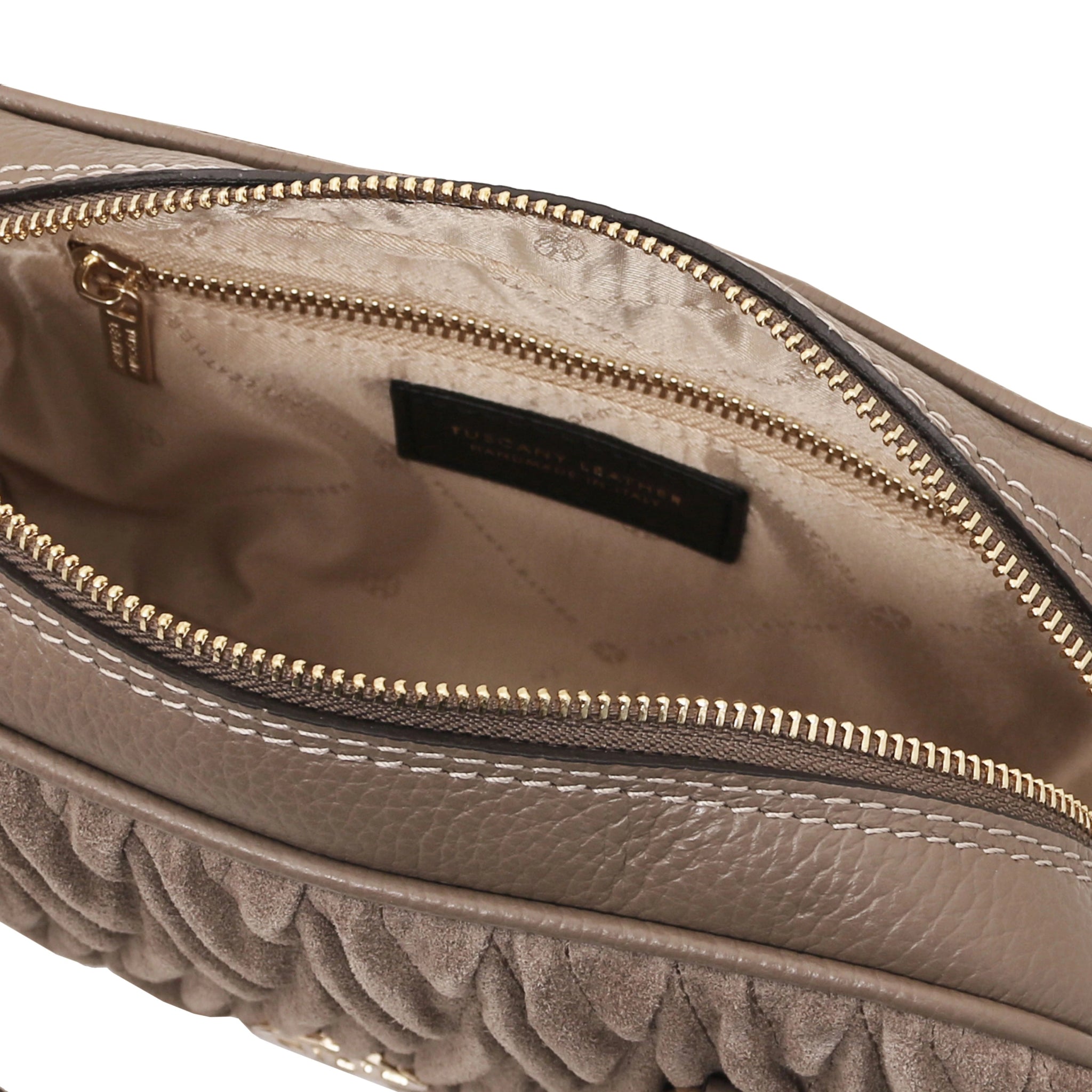 Interior view of Chantilly Suede Handbag in dark taupe with beige lining and zip pocket