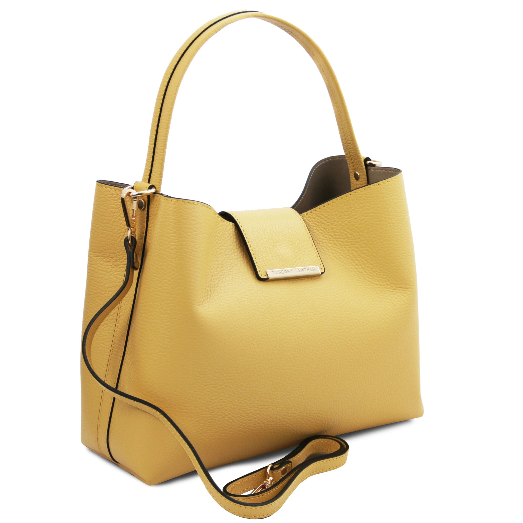 Side view Clio Italian Pebbled Leather Secchiello Bag in pastel yellow with a cross body strap