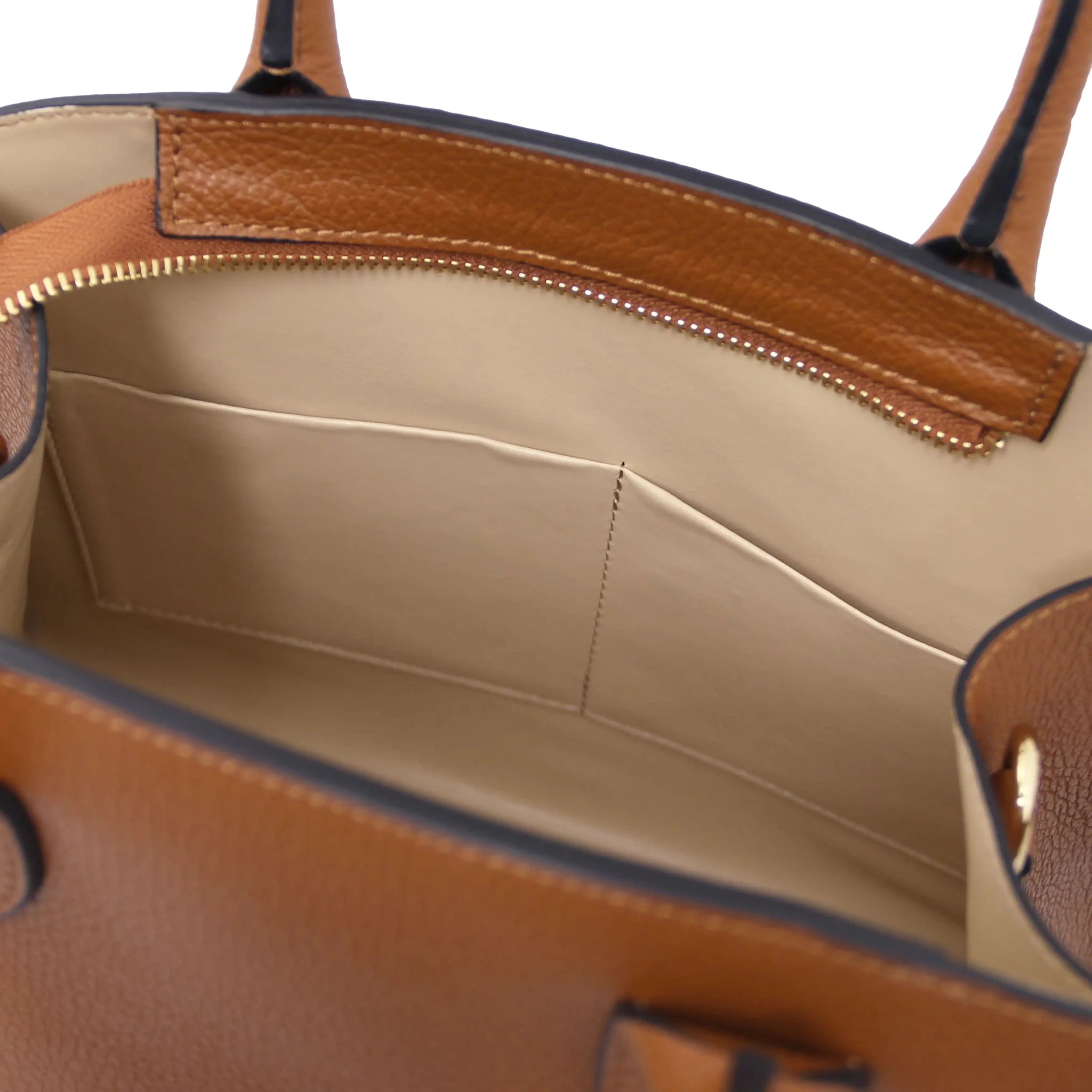 Interior open Pocket View Coccola Italian Pebbled Leather Handbag in Cognac with beige lining