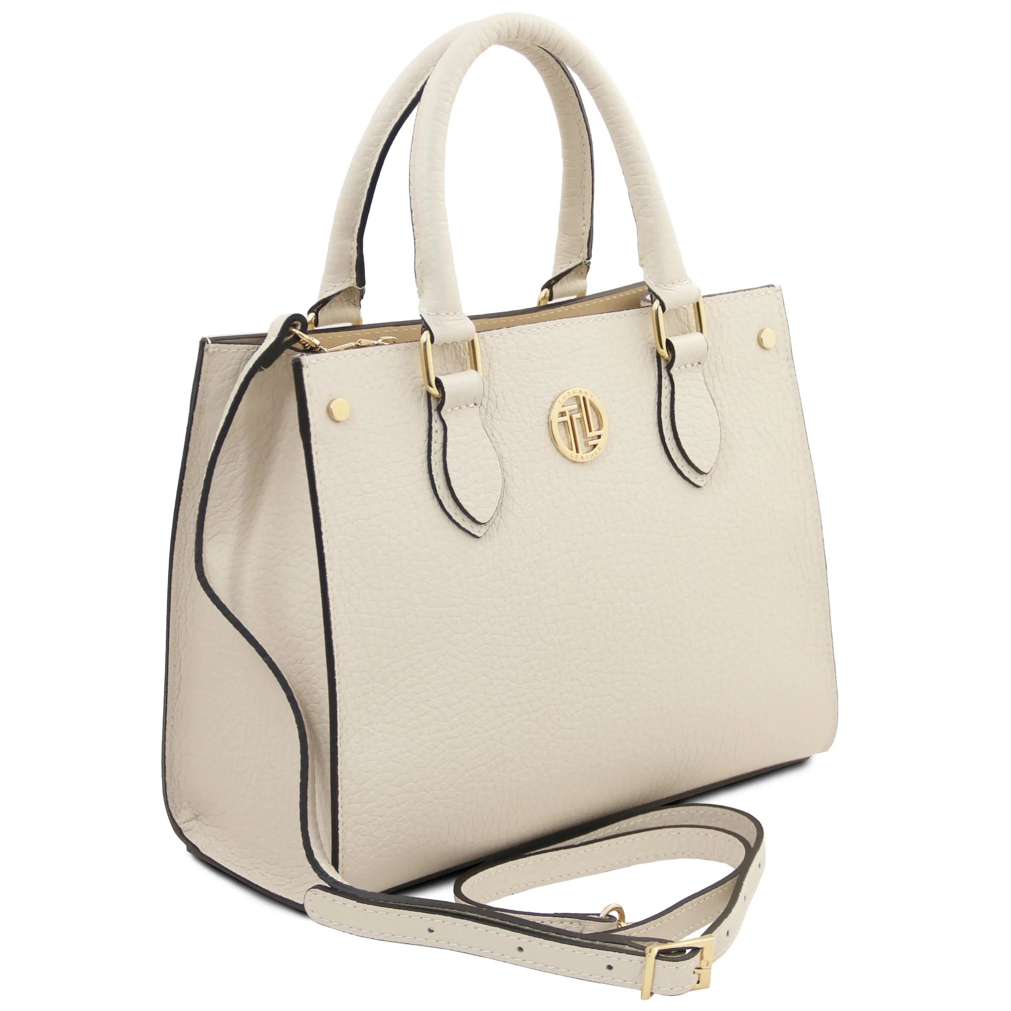Front angled view Croque Italian Pebbled Leather Handbag in beige with shoulder strap