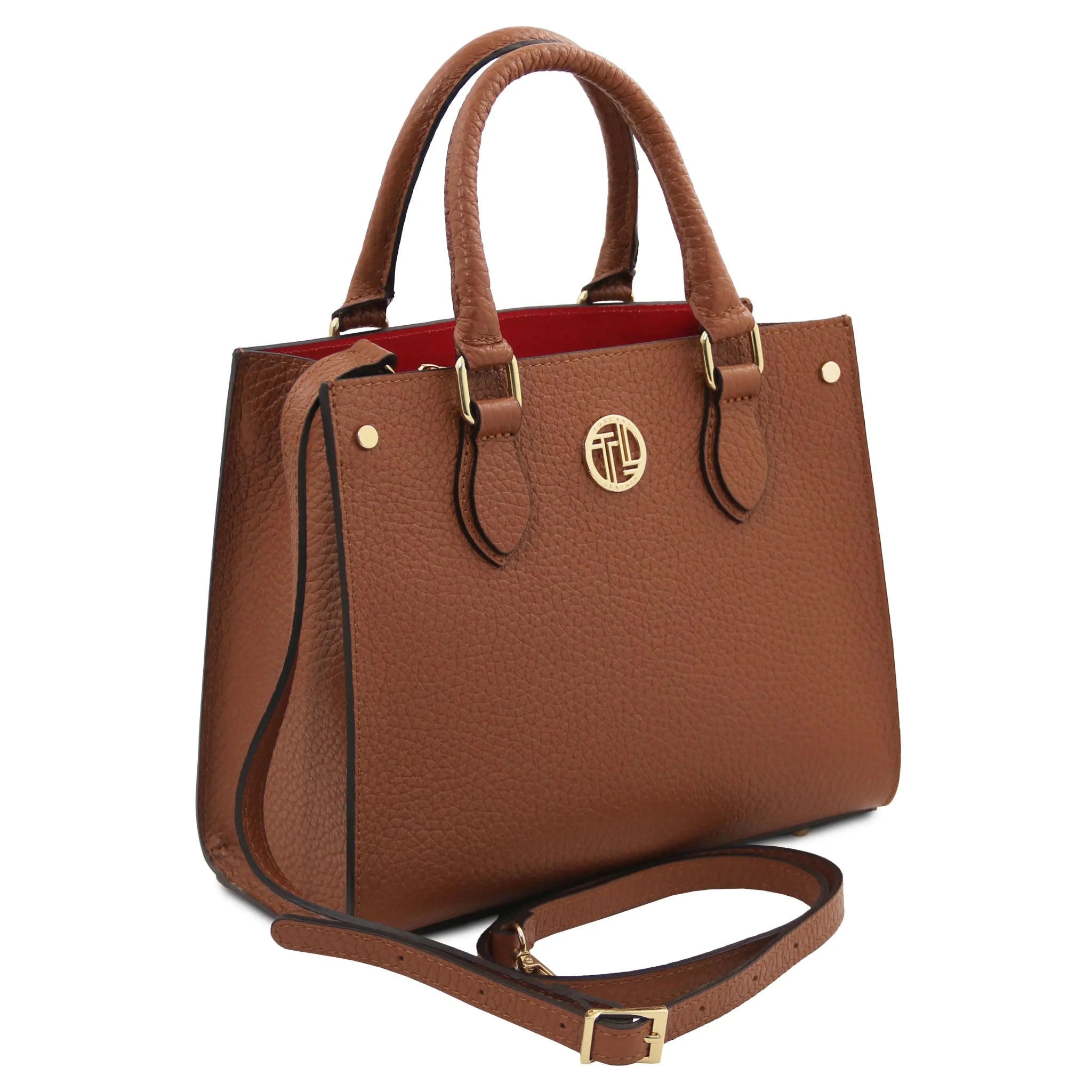 Front angled view Croque Italian Pebbled Leather Handbag in cognac with shoulder strap