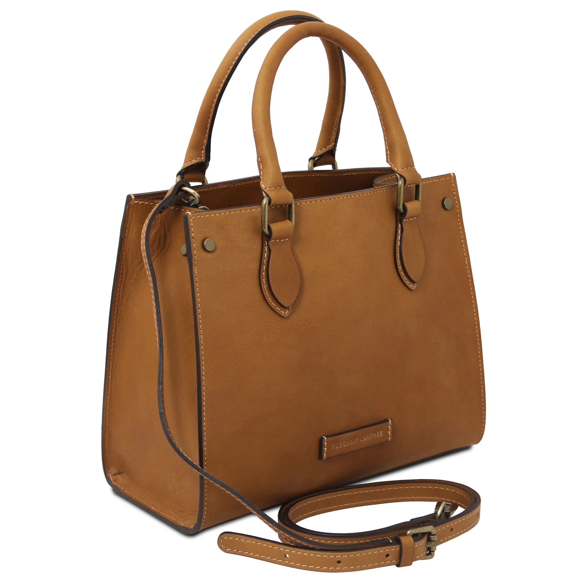 Front angled view Dama Leather Handbag in natural with removable shoulder strap