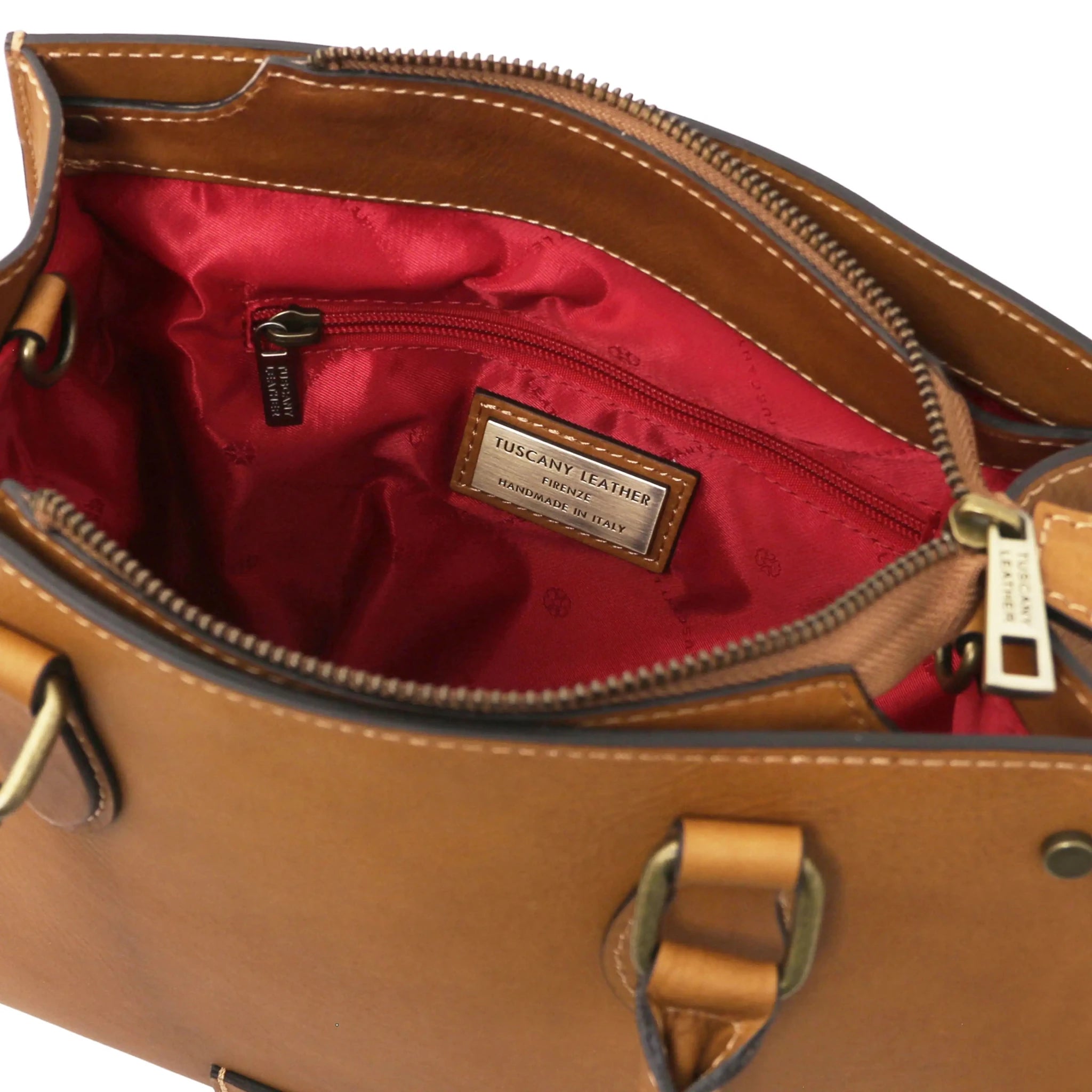 Interior zip pocket red lining view Dama Leather Handbag in natural