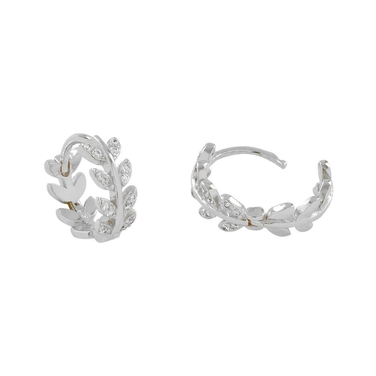 Close up image of the Dancing Leaves Cubic Zirconia Huggie Hoop Silver Earrings on a white background and showing the CZ's sparkle