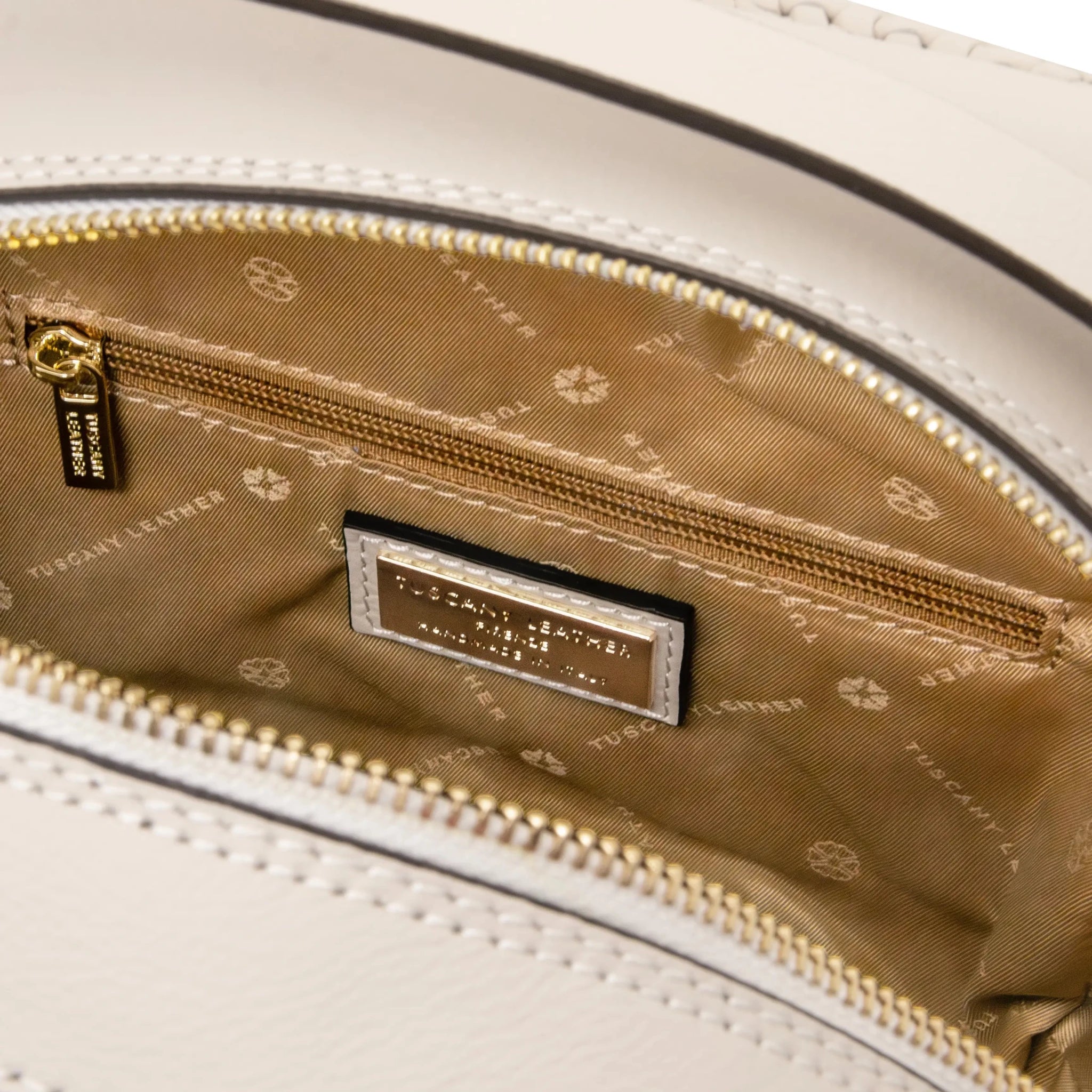 Interior zip pocket view Dedalo Leather Backpack in beige with tan lining