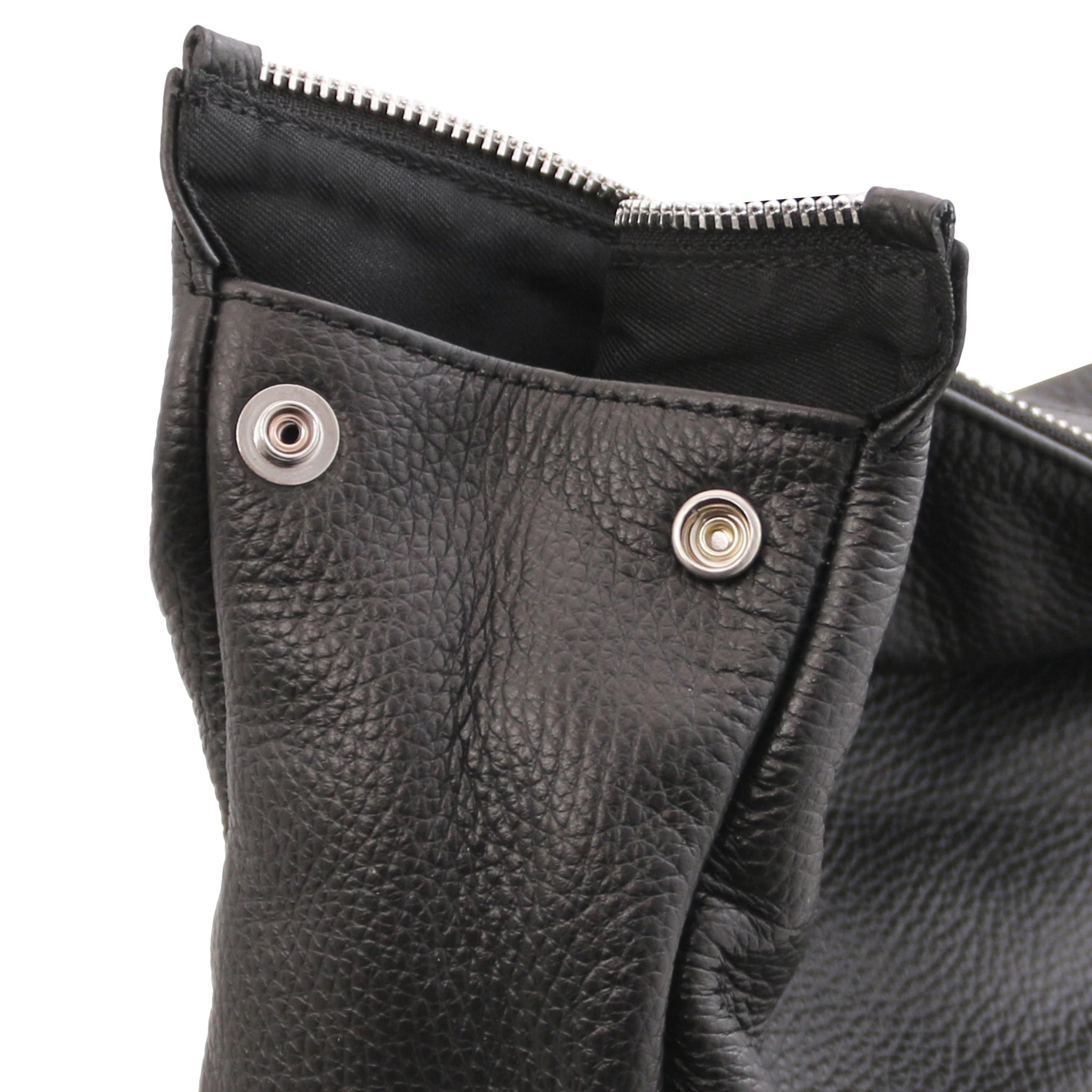 Side view Denver Soft Italian Leather Backpack in Black featuring main side snap closure