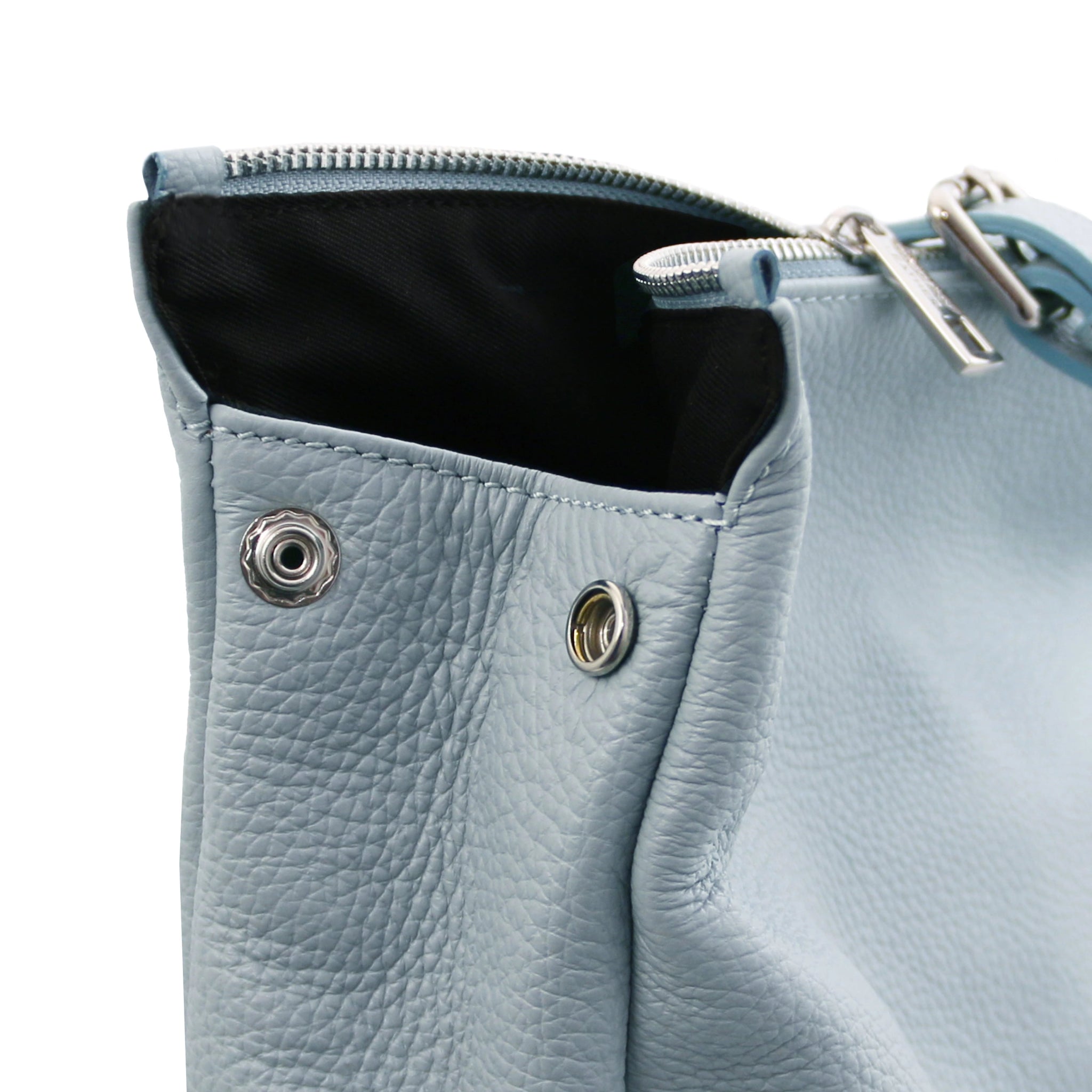 Side view Denver Soft Italian Leather Backpack in Light Blue featuring main side snap closure
