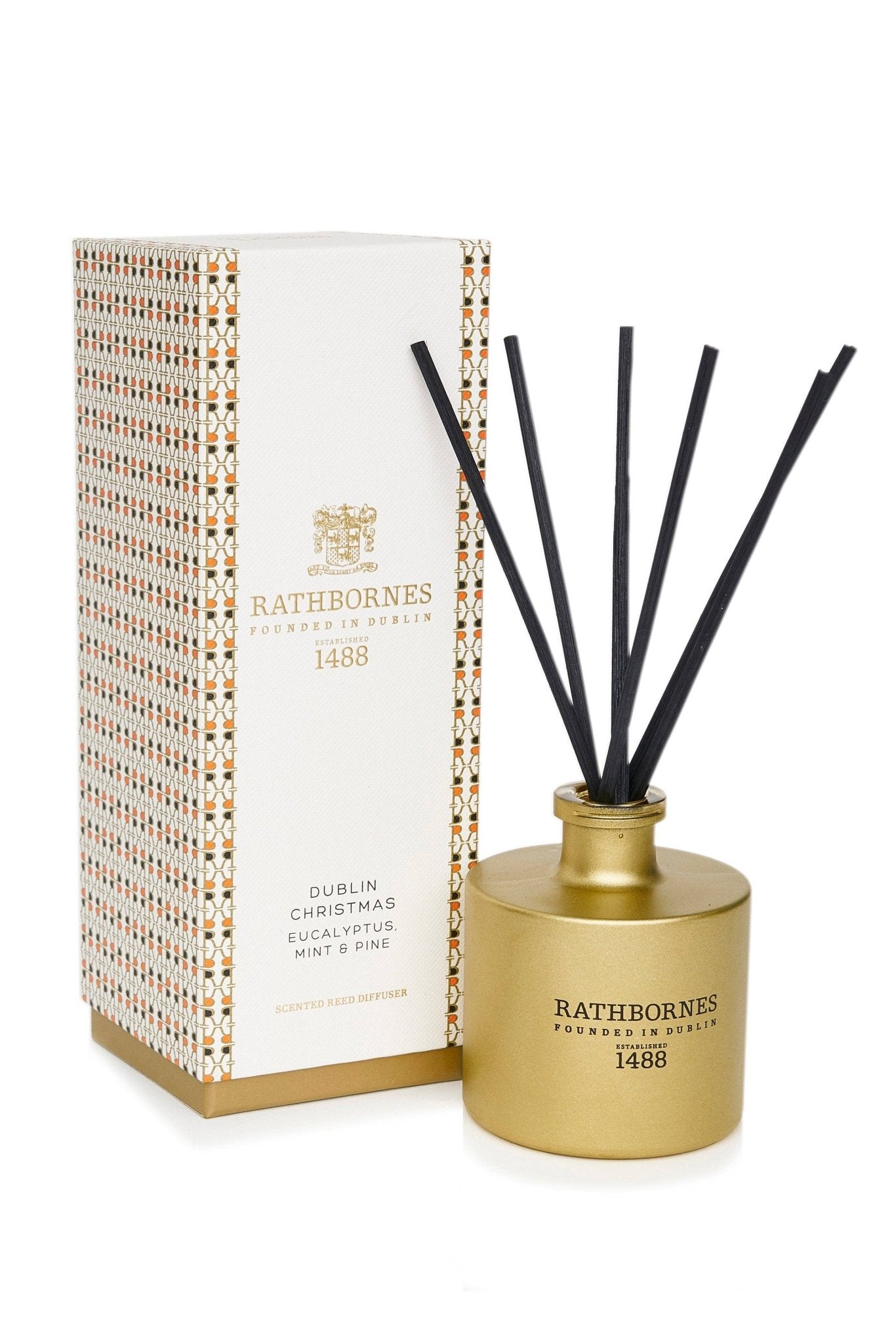 Dublin Christmas Scented Reed Diffuser (Eucalyptus, Mint & Pine) - gold bottle and decorative shipping box on a white background