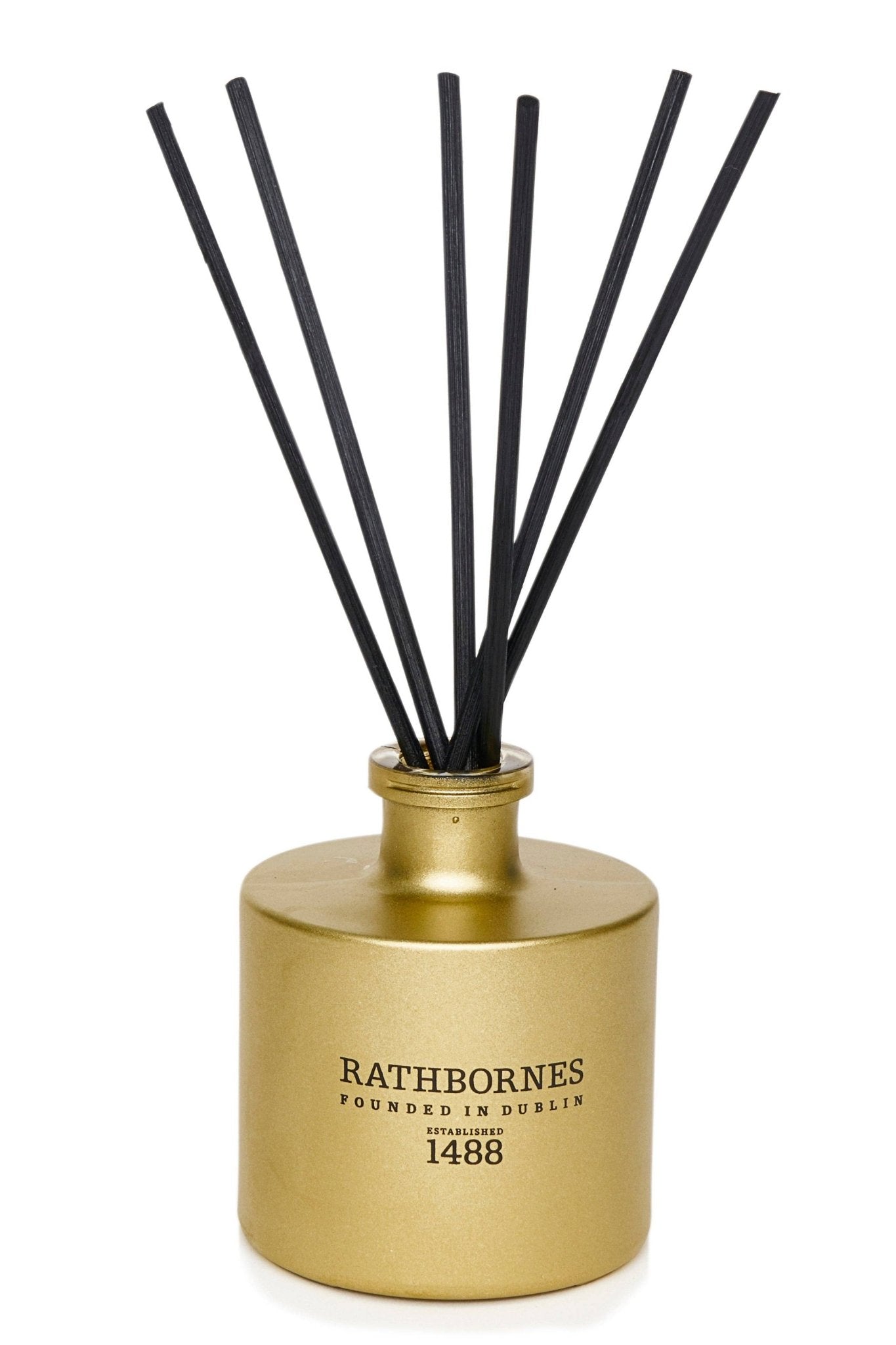 Dublin Christmas Scented Reed Diffuser (Eucalyptus, Mint & Pine) gold bottle with black reeds on a white background