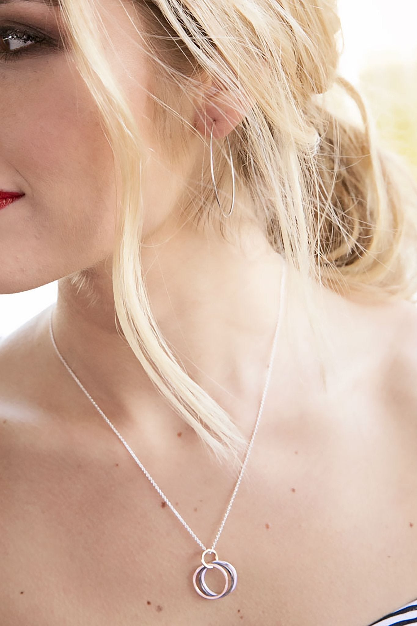 Endless Possibilities Sterling Silver Necklace on model showing the center chest length.