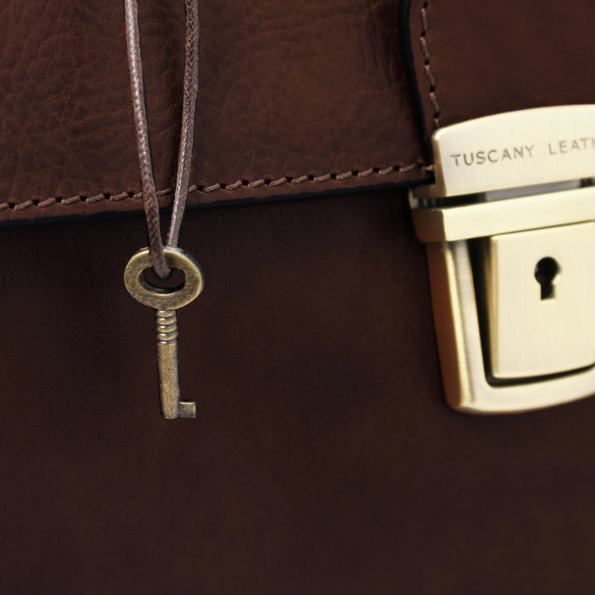 Close up view of key and lock, Giotto Exclusive Double - bottom Italian Leather Doctor Bag in dark brown