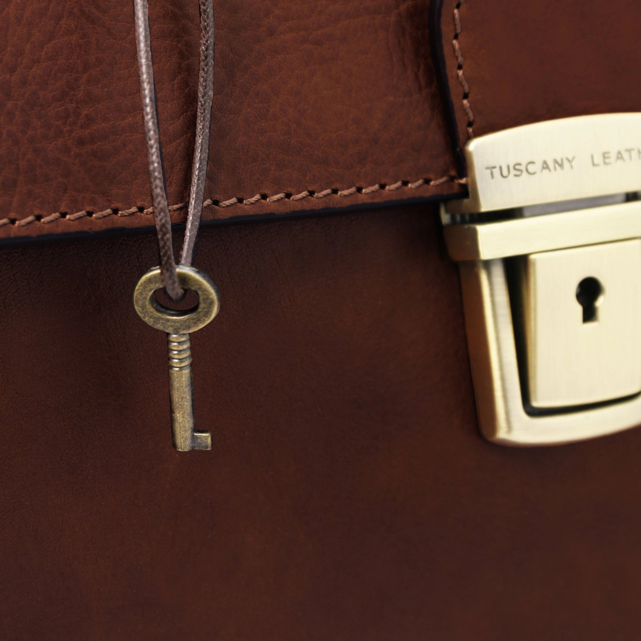 Close up view of key and lock, Giotto Exclusive Double - bottom Italian Leather Doctor Bag in brown