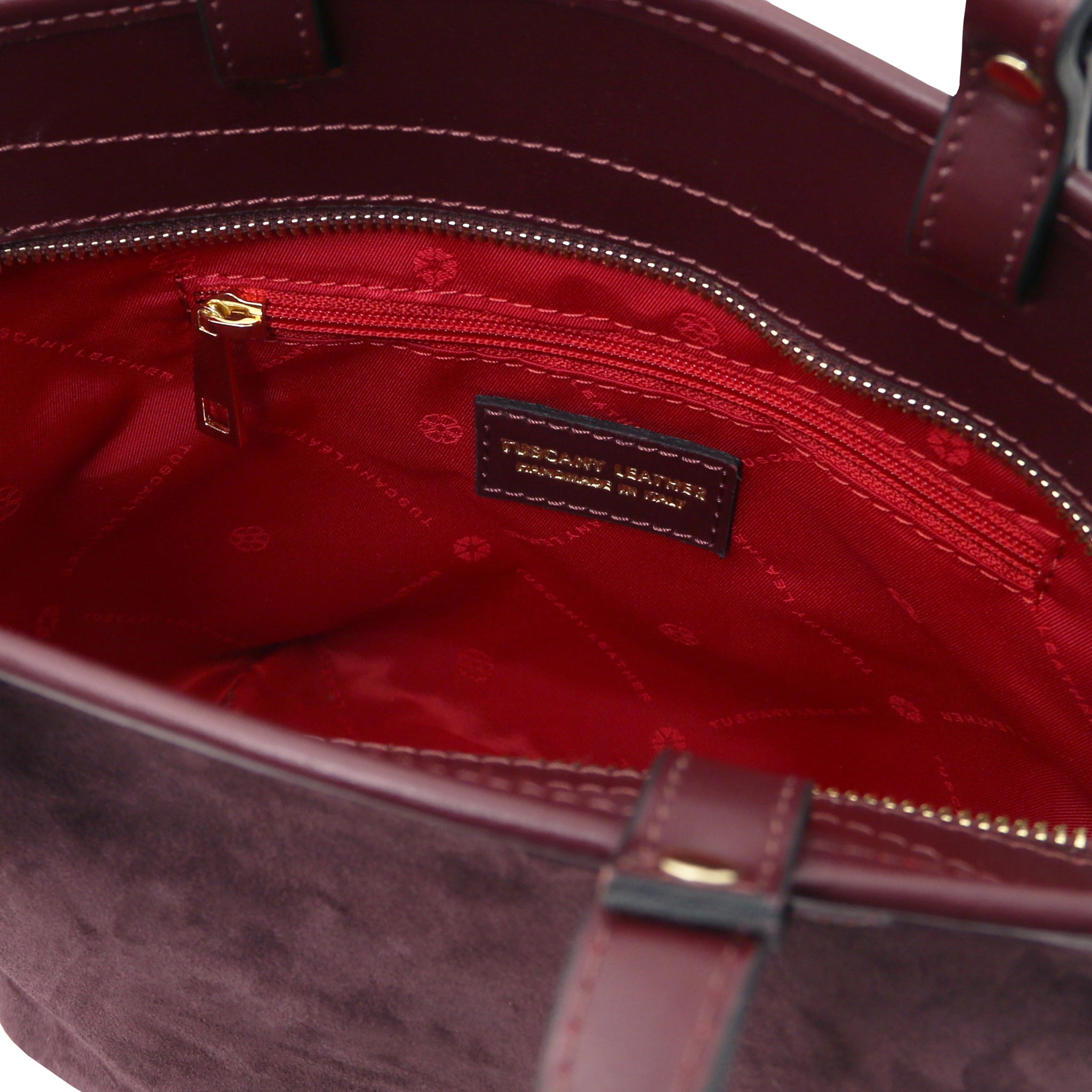 Interior zip pocket red lining view Glacette Suede Bucket bag in Bordeaux