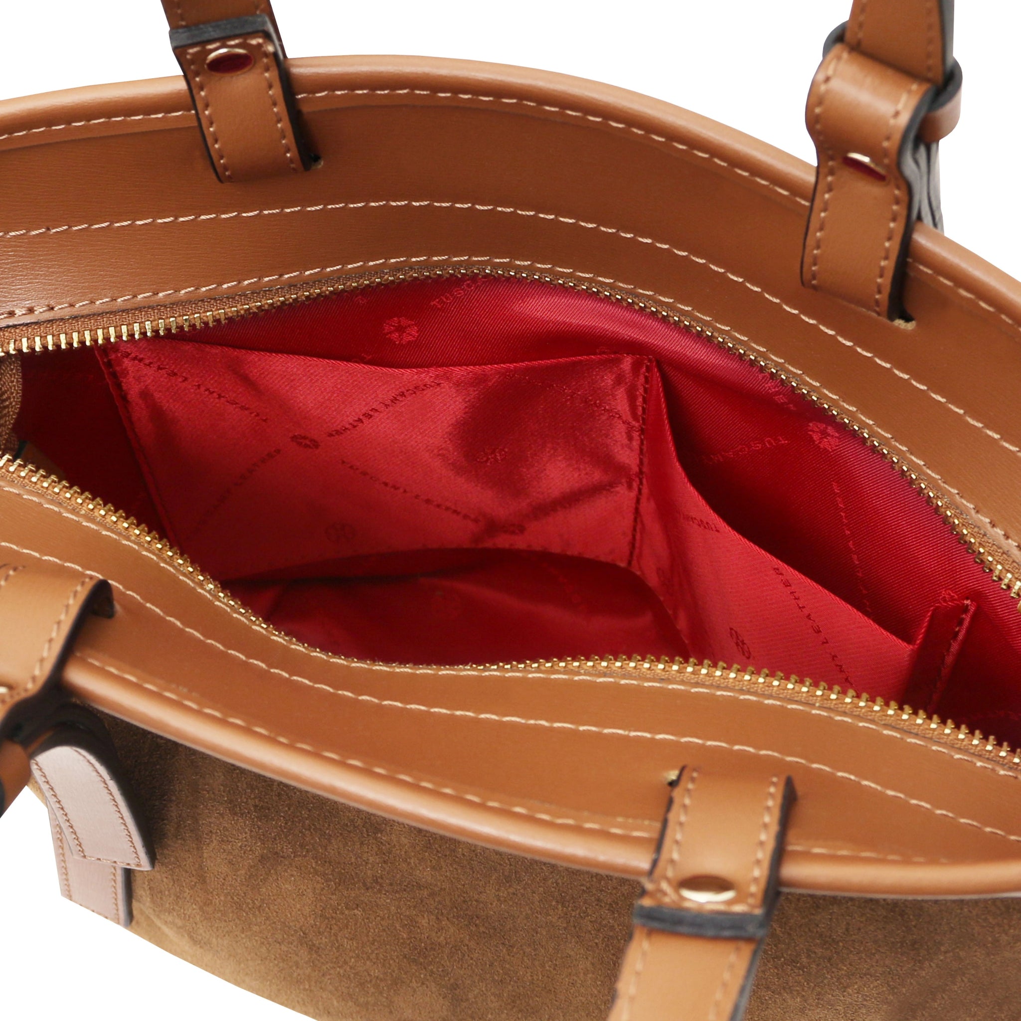 Interior open pockest red lining view Glacette Suede Bucket bag in Cognac