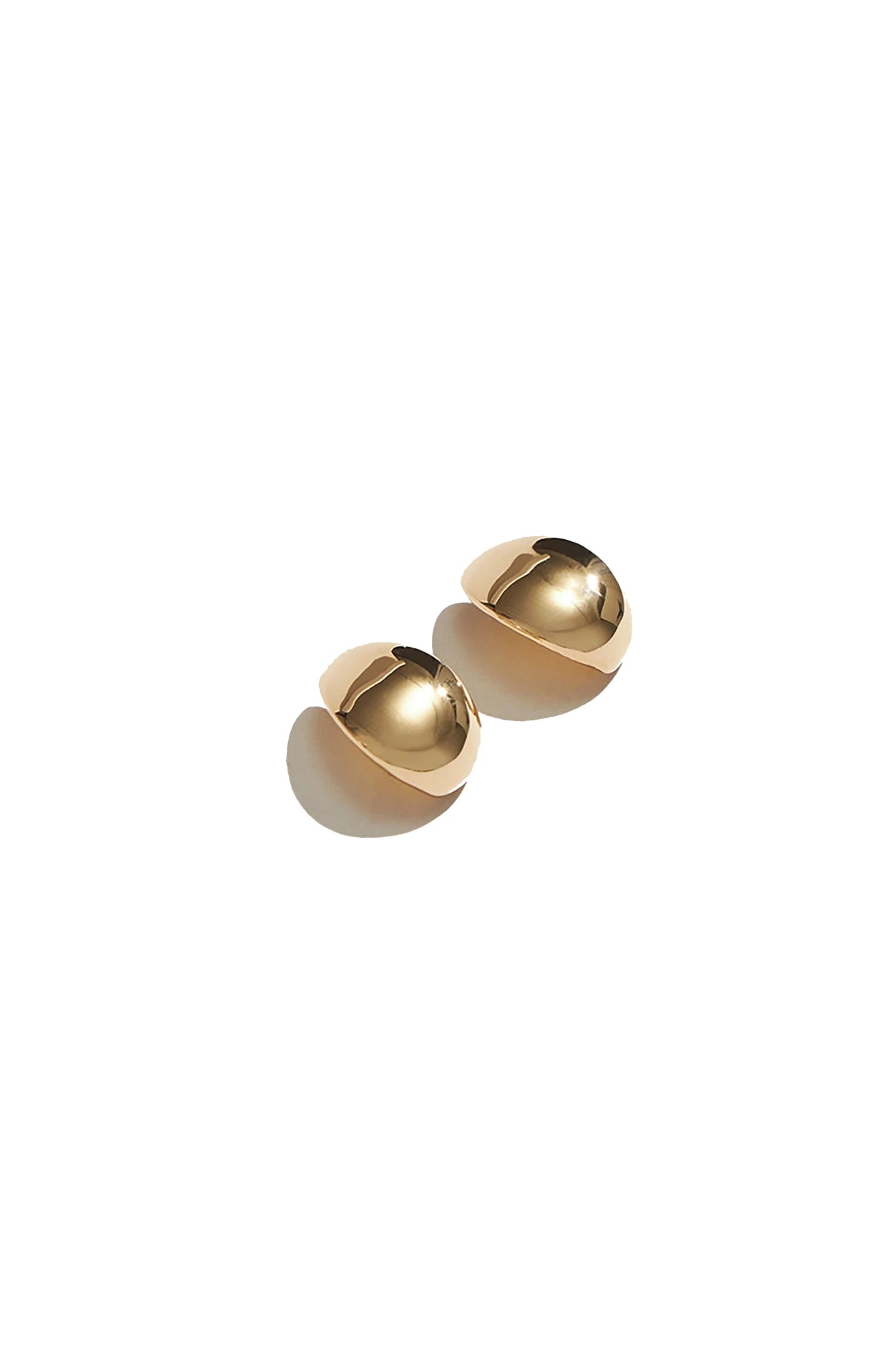 Golden Serenity Huggie Hoop Earrings on a white background