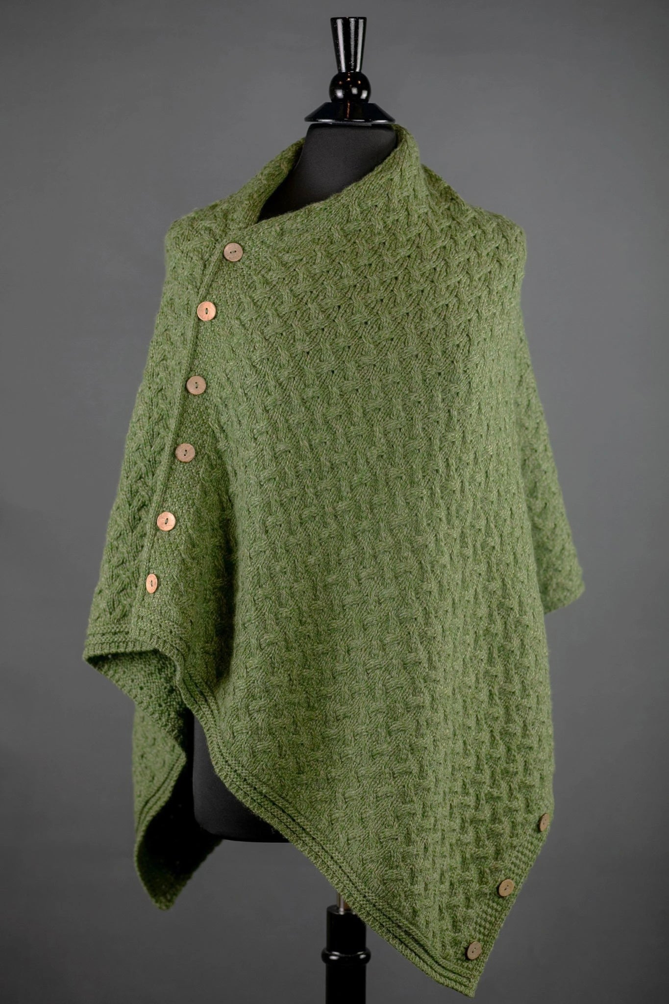 Irish Clew Bay Supersoft Convertible Cape in green on a bust form