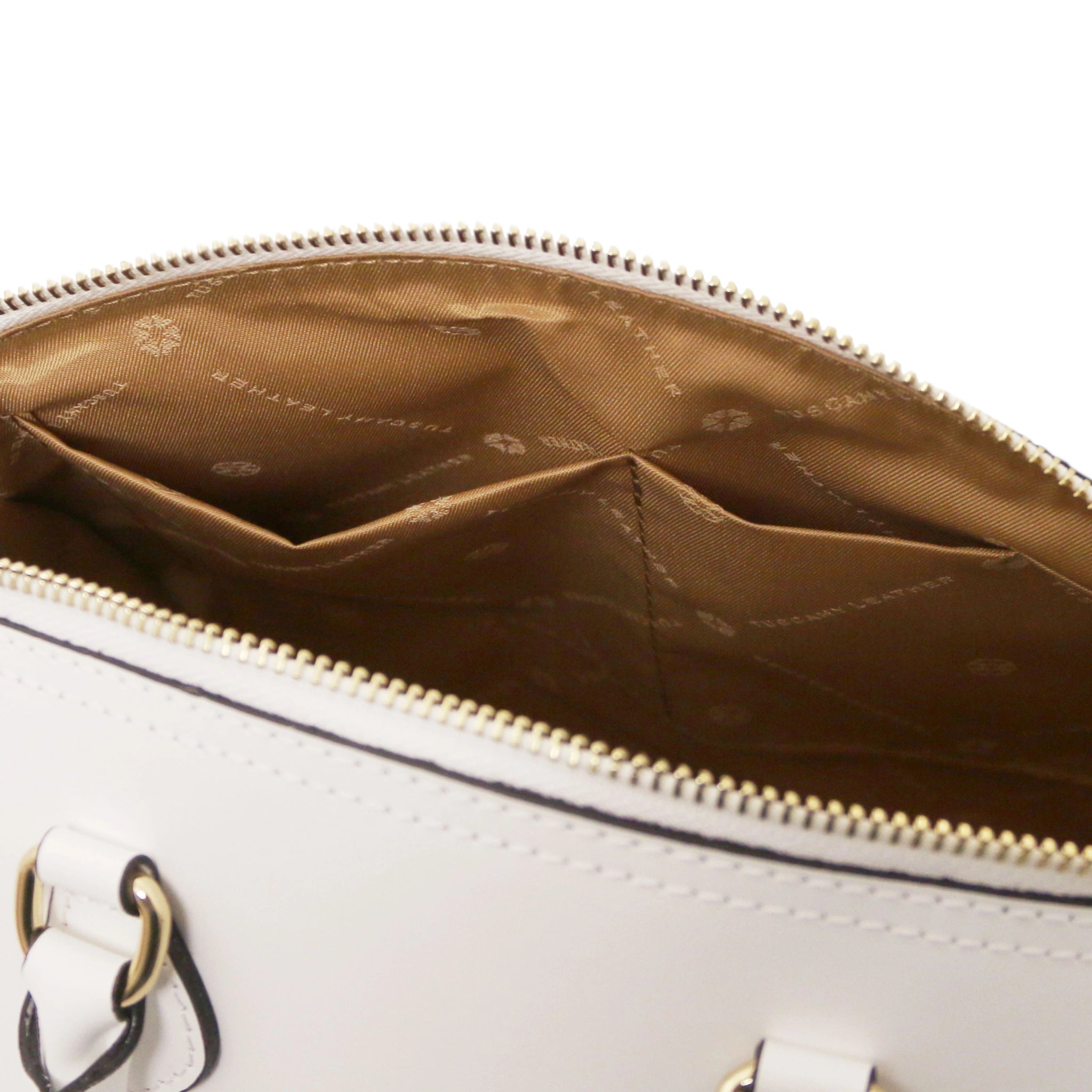 Interior two open pockets view of Layla Italian Leather Duffle Bag in white showing the beige lining