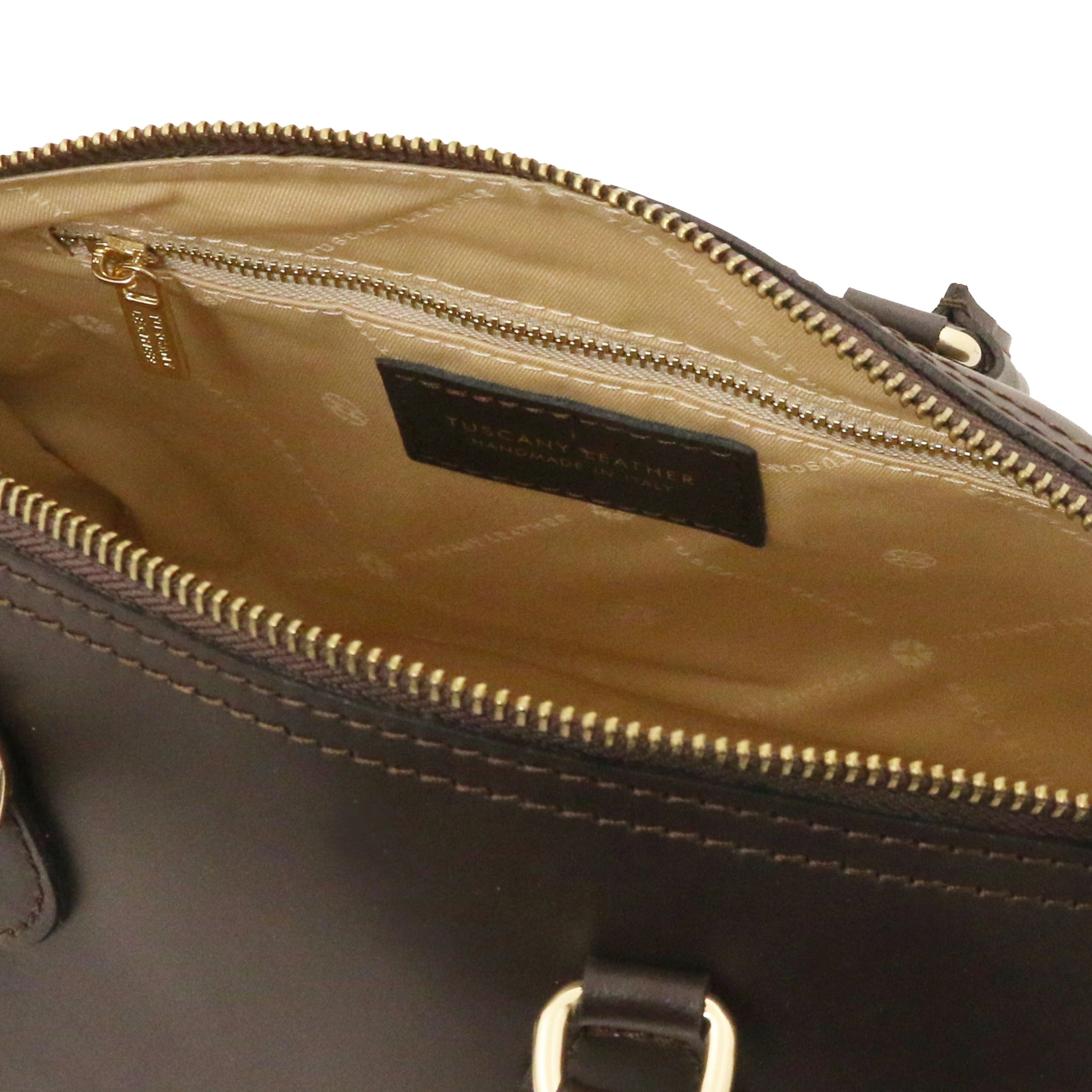 Interior zip pocket view of Layla Italian Leather Duffle Bag in coffee showing the beige lining