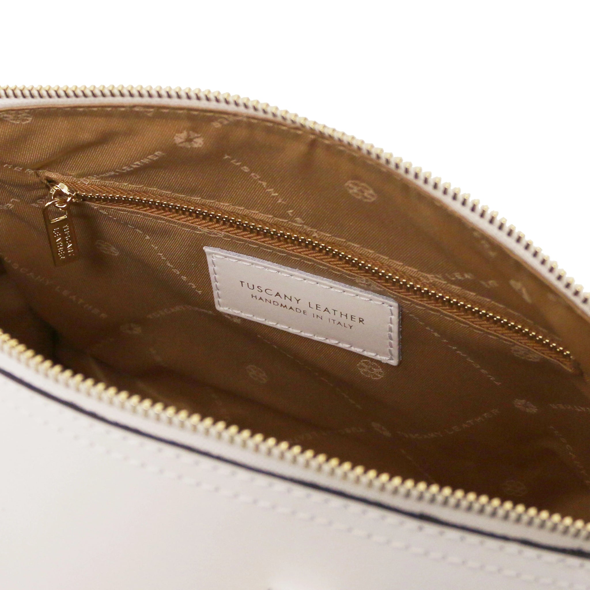 Interior zip pocket view of Layla Italian Leather Duffle Bag in white showing the tan lining